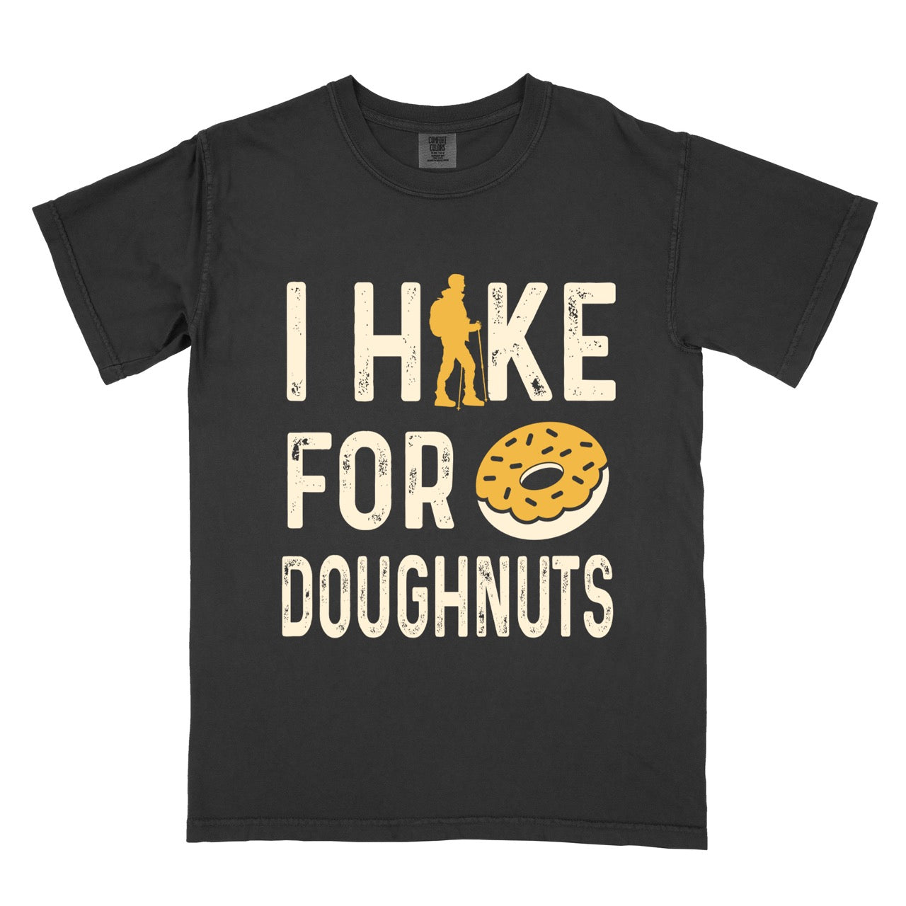 black Doughnut donut lover statement tee I Hike for Doughnuts with vintage distressed cream typography character silhouette with trekking pole and illustrated glazed doughnut with sprinkles on Comfort Colors shirt for sweet treat enthusiasts, hikers and foodies.
