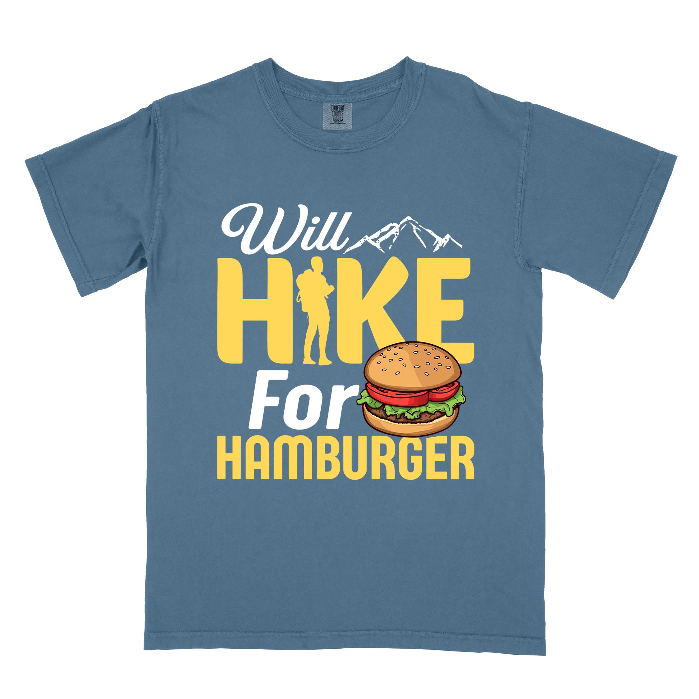 Blue jean "Will Hike for Hamburger" colored vintage tee with bold typography, birds, mountains, illustrated juicy hamburger, and backpacker for burger enthusiasts.