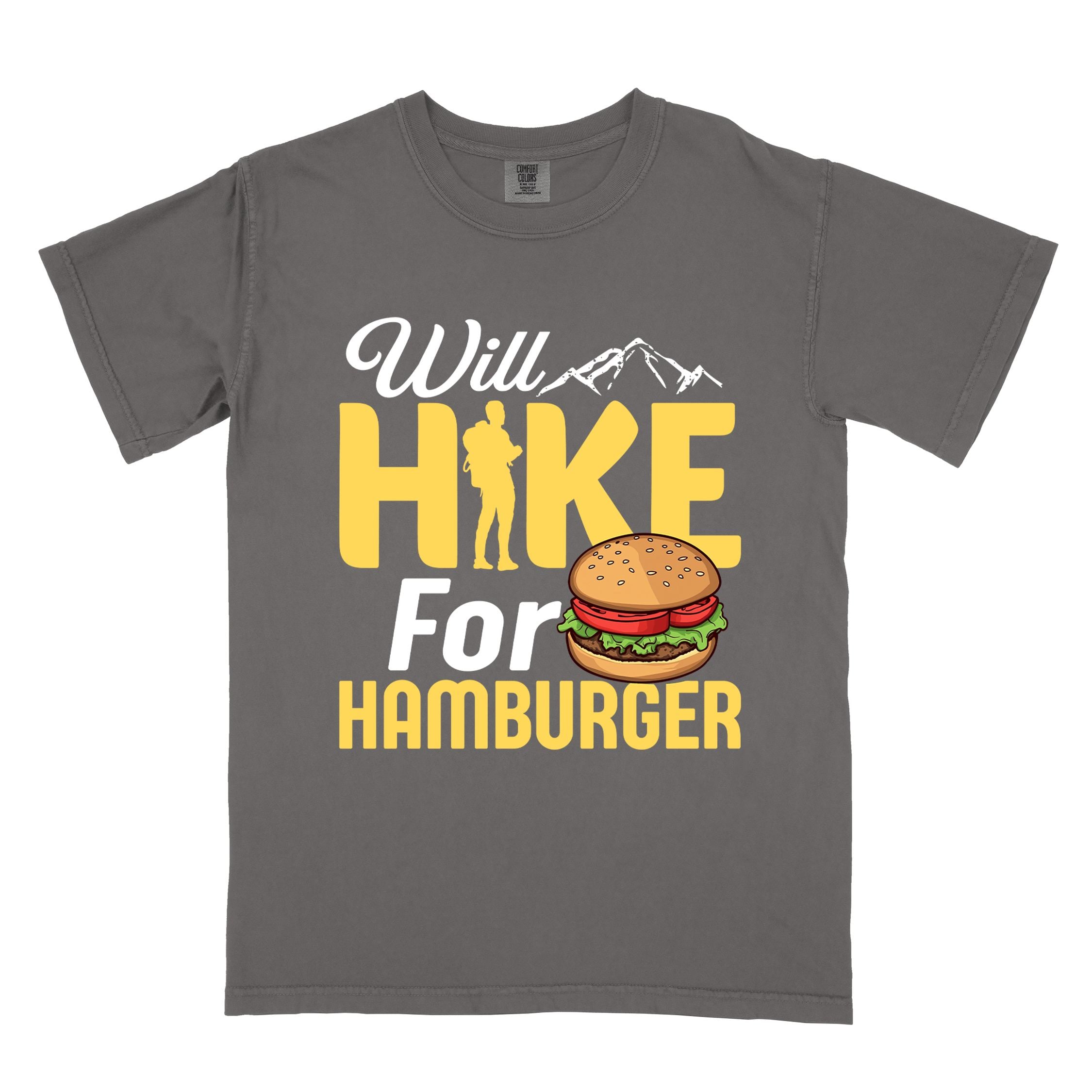 Pepper "Will Hike for Hamburger" colored vintage tee with bold typography, birds, mountains, illustrated juicy hamburger, and backpacker for burger enthusiasts.