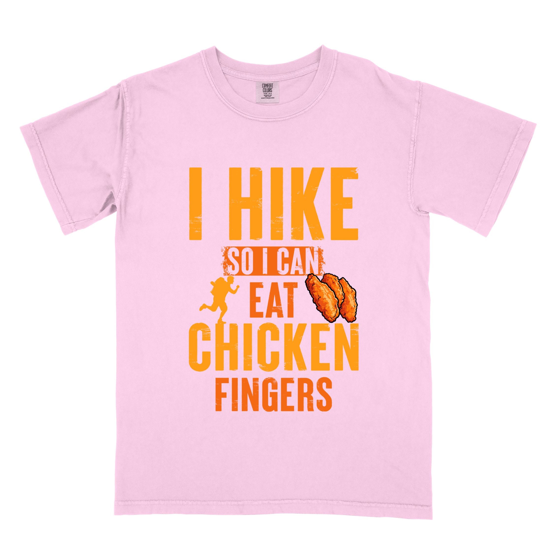 Blossom "I Hike so I can eat Chicken Fingers" colored vintage tee with bold typography, illustrated crispy fried chicken fingers, perfect for comfort food lovers.