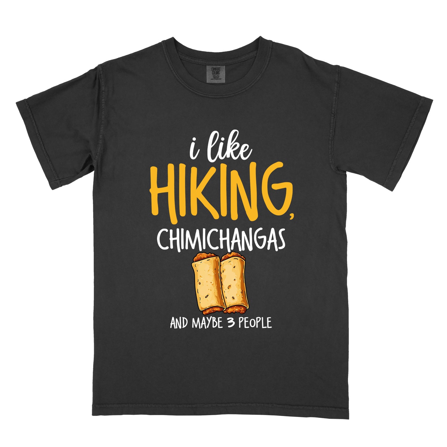 Black t-shirt with text "i like HIKING, CHIMICHANGAS AND MAYBE 3 PEOPLE". The phrase "i like" appears in white script at the top, "HIKING," in yellow letters, "CHIMICHANGAS" in white, and "AND MAYBE 3 PEOPLE" in white at the bottom. Between "CHIMICHANGAS" and "AND MAYBE 3 PEOPLE" is an illustration of two chimichangas (fried burritos) with visible fillings. The design combines hiking, food, and introvert humor.