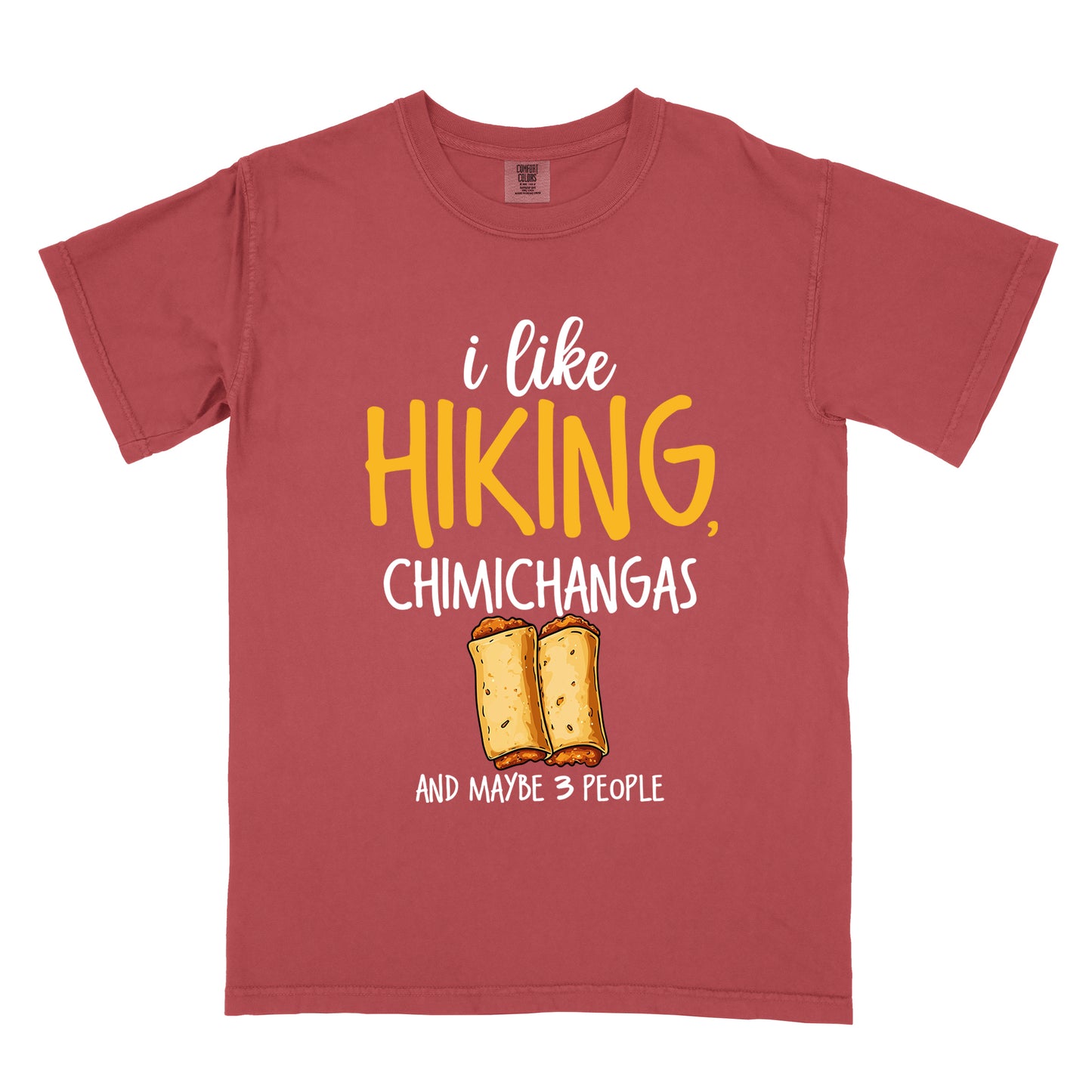 Crimson (Dark Pink) t-shirt with text "i like HIKING, CHIMICHANGAS AND MAYBE 3 PEOPLE". The phrase "i like" appears in white script at the top, "HIKING," in yellow letters, "CHIMICHANGAS" in white, and "AND MAYBE 3 PEOPLE" in white at the bottom. Between "CHIMICHANGAS" and "AND MAYBE 3 PEOPLE" is an illustration of two chimichangas (fried burritos) with visible fillings. The design combines hiking, food, and introvert humor.