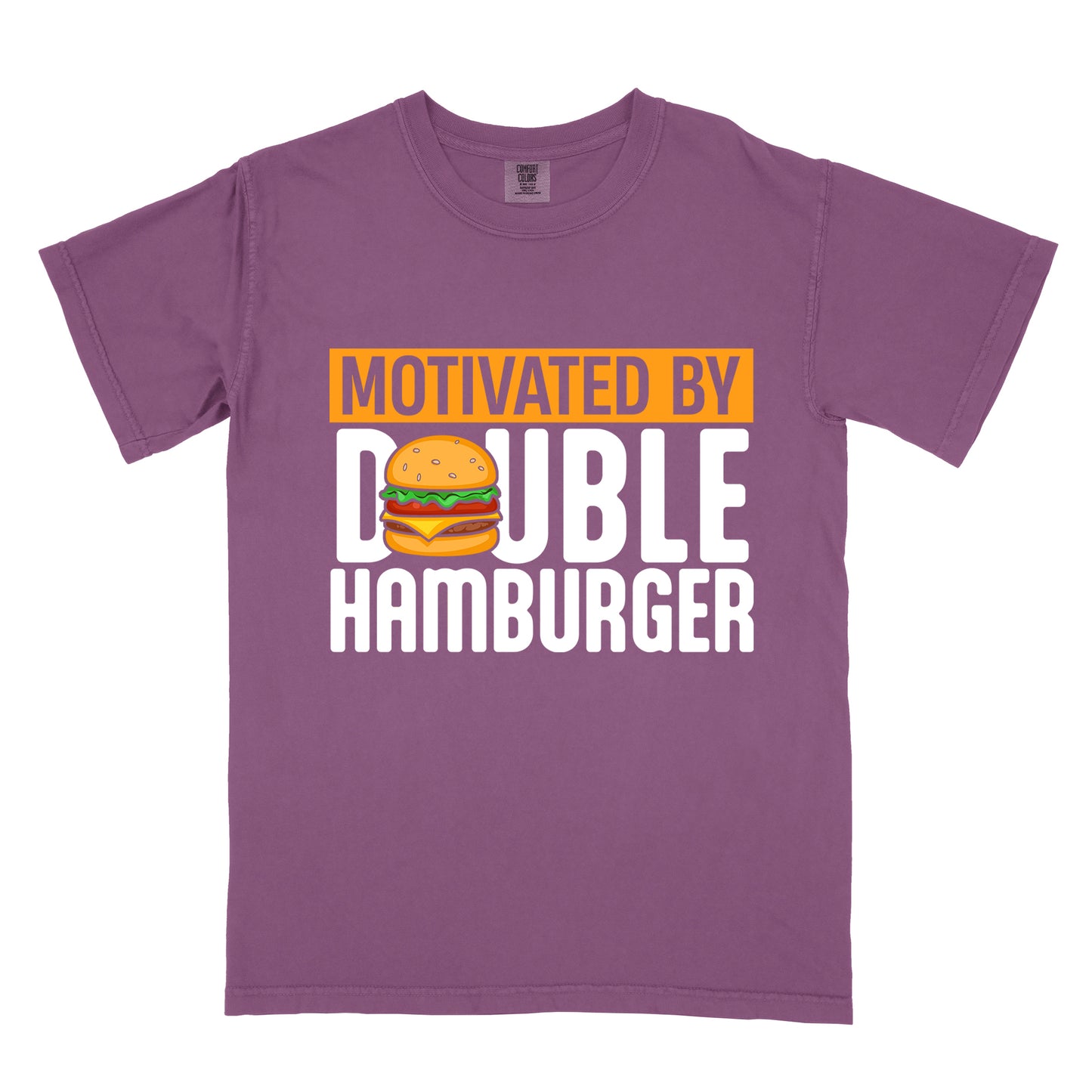 Berry (Dark Violet) t-shirt with text "MOTIVATED BY DOUBLE HAMBURGER". "MOTIVATED BY" appears in Berry (Dark Violet) text on an orange rectangular background at the top. "DOUBLE HAMBURGER" appears in large white letters below, with a colorful hamburger illustration replacing the letter "O" in "DOUBLE". The hamburger graphic shows a sesame seed bun, lettuce, tomato, cheese, and beef patty.