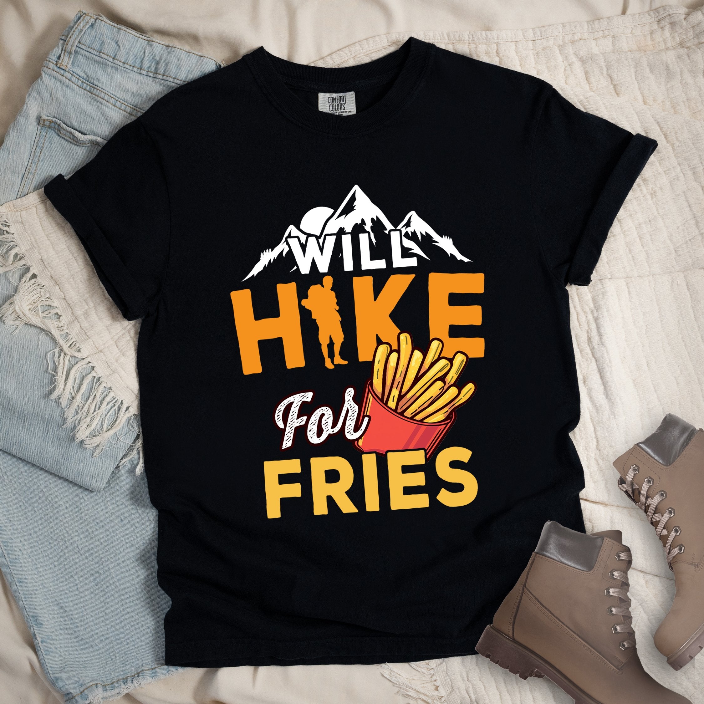 Black shirt with Hiking Design featuring the phrase “Will Hike for Fries” and an illustration of a red fries container below a mountain outline and hiker silhouette.