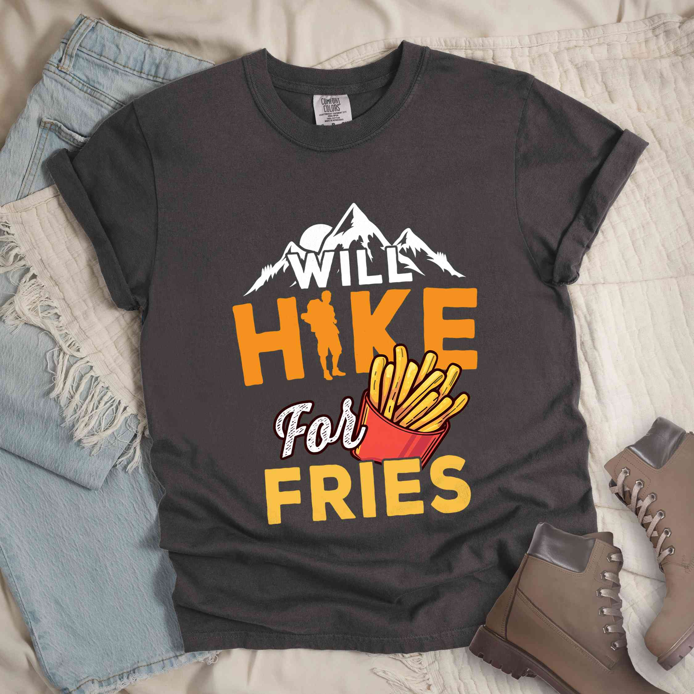 Pepper "Will Hike for Fries" colored vintage tee with bold typography, mountains, illustrated fries, and backpacker for comfort food enthusiasts.