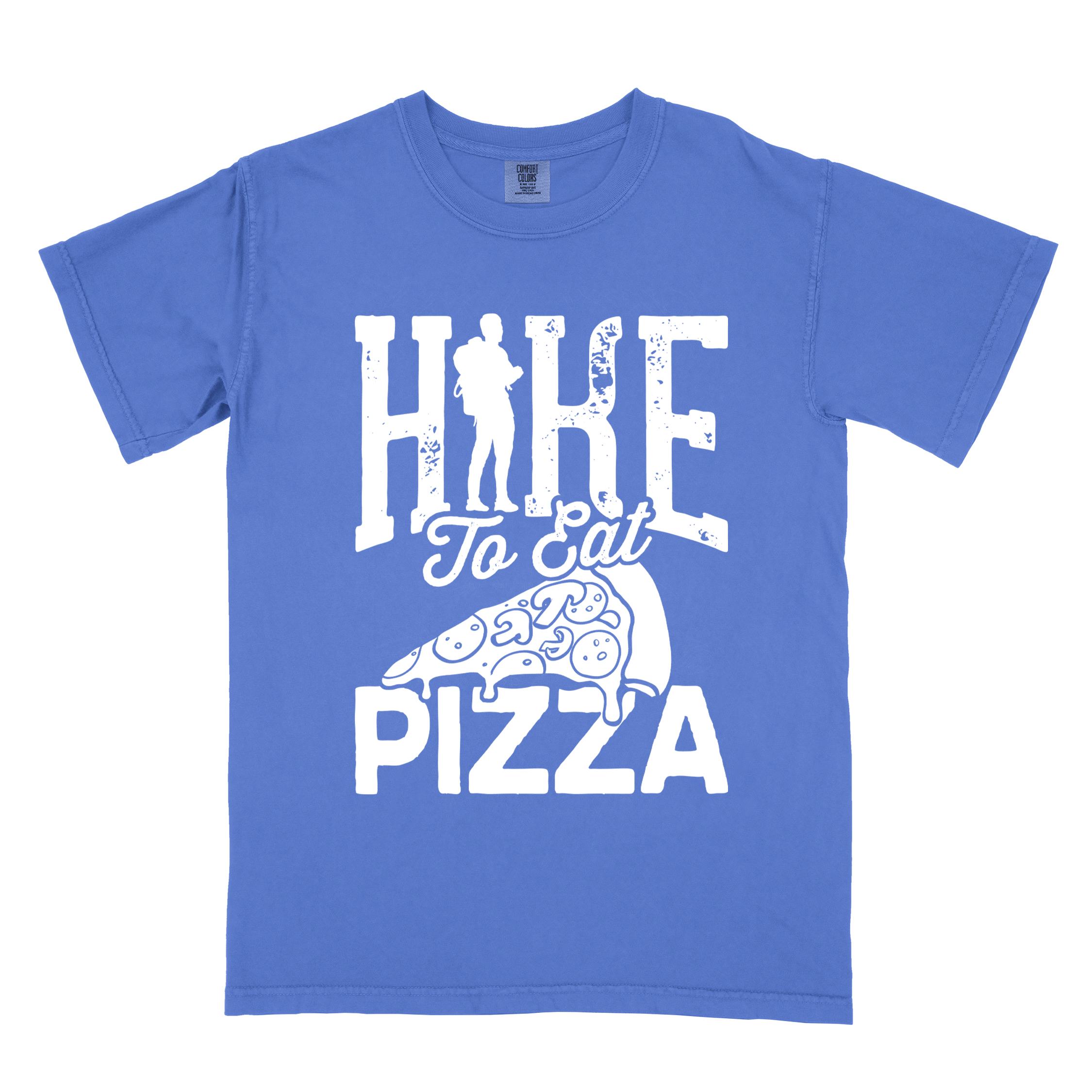 Flo blue "Hike to eat Pizza" colored vintage tee with bold typography, birds, mountains, illustrated pizza slice, and backpacker for pizza lover.