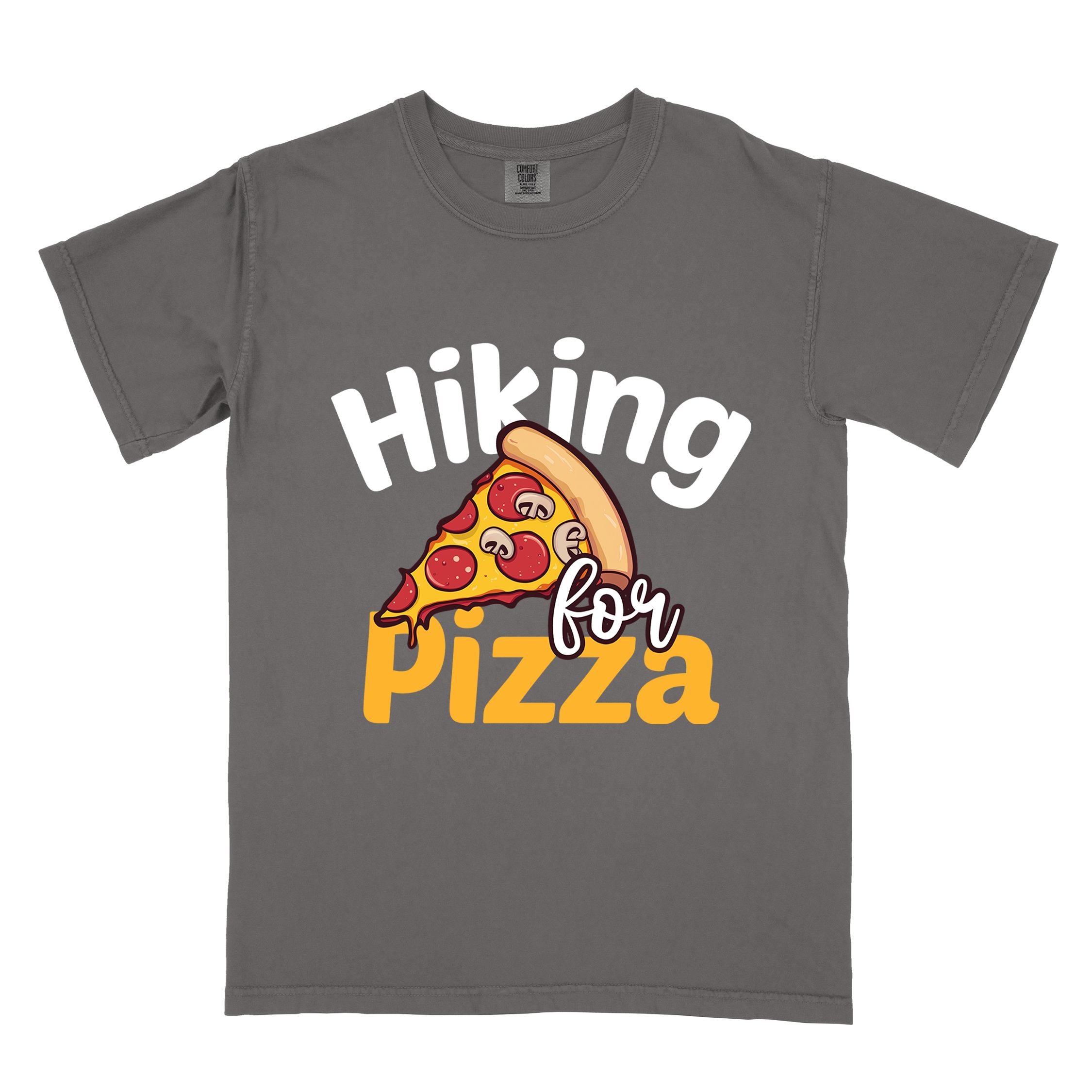 Pepper "Hiking for pizza" colored vintage tee with bold typography, illustrated pizza slice, and backpacker for pizza lover.