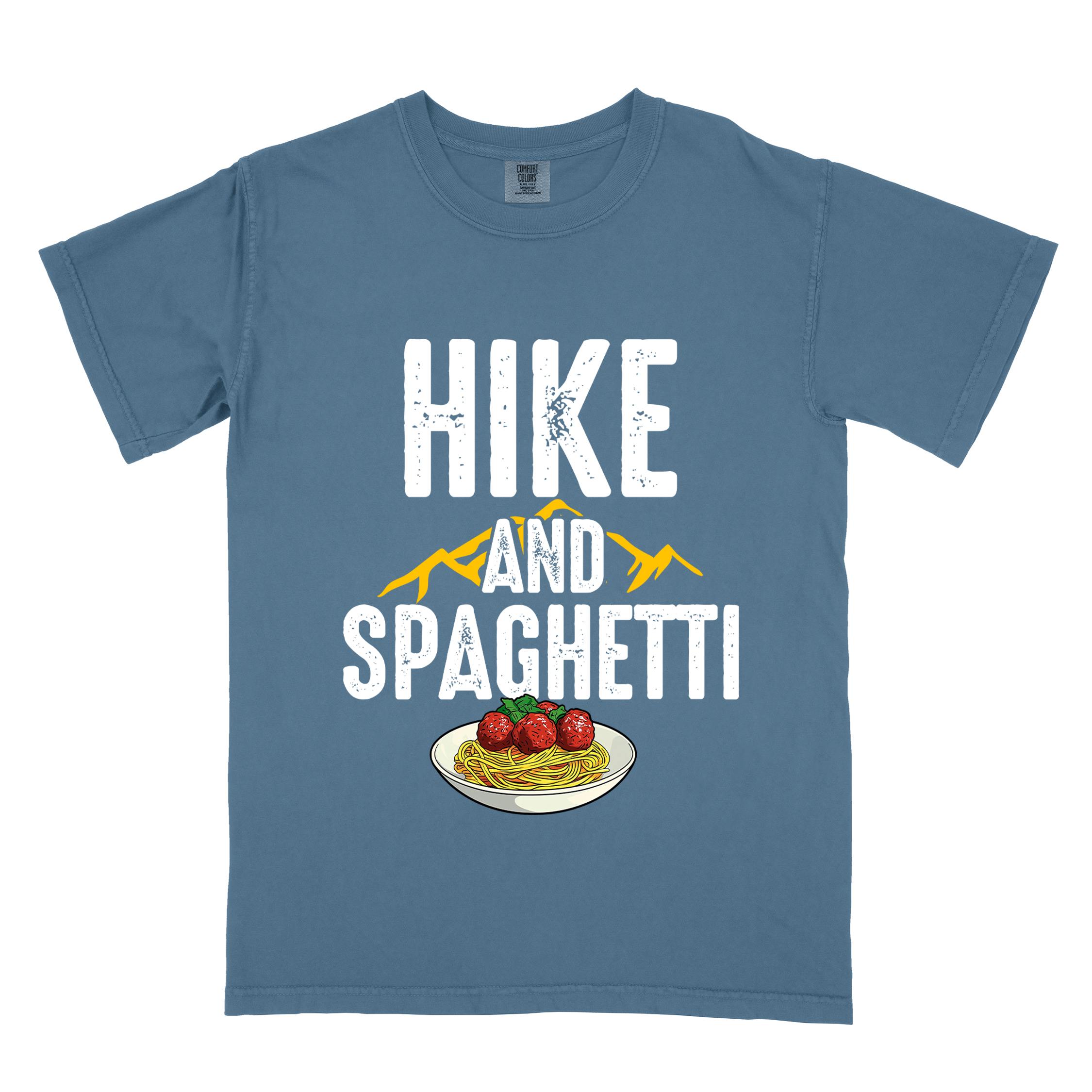 Blue jean "Hike and Spaghetti" colored vintage tee with bold typography, birds, mountains, illustrated plate of spaghetti and meatballs, and backpacker for pasta lovers.