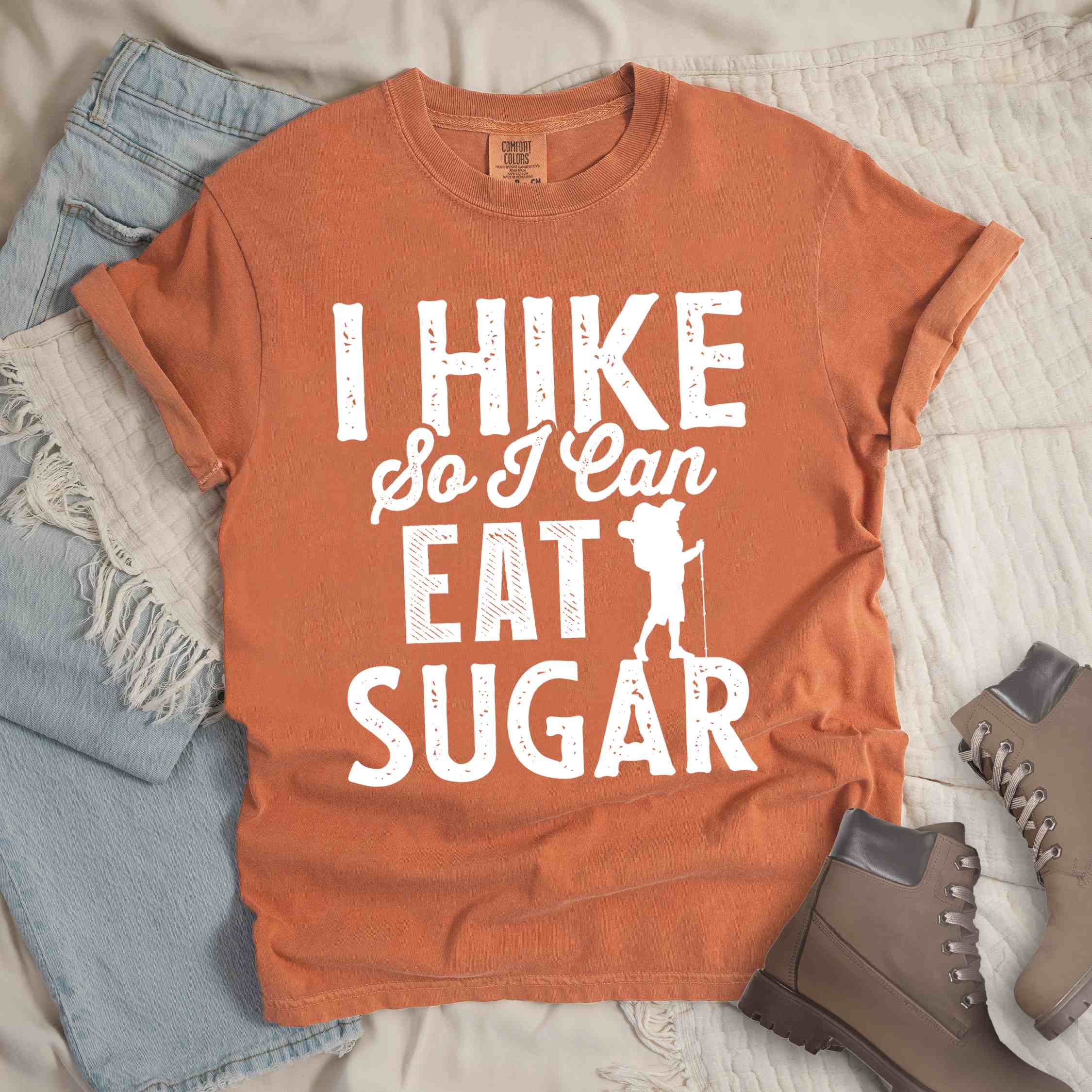 Yam "I hike so I can eat sugar" colored vintage tee with bold typography, and backpacker with a sweet tooth.