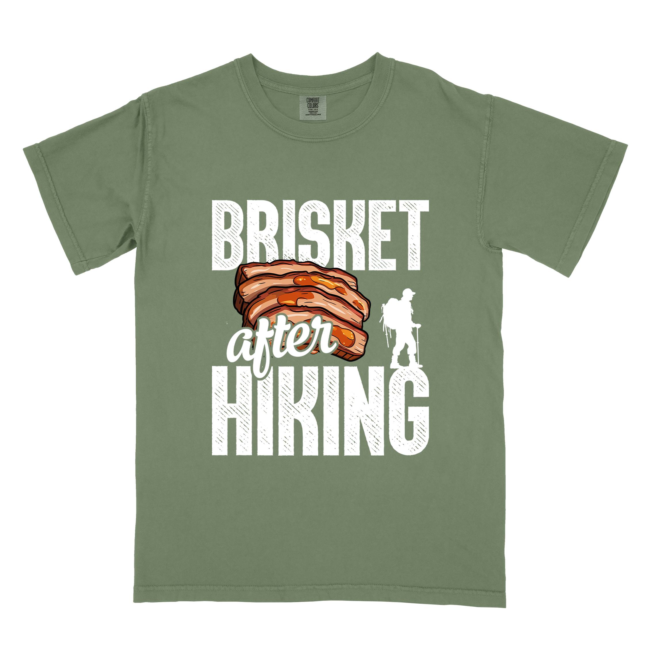 Moss "Brisket after hiking" colored vintage tee with bold typography, birds, mountains, illustrated bbq beef brisket, and backpacker for bbq lovers.