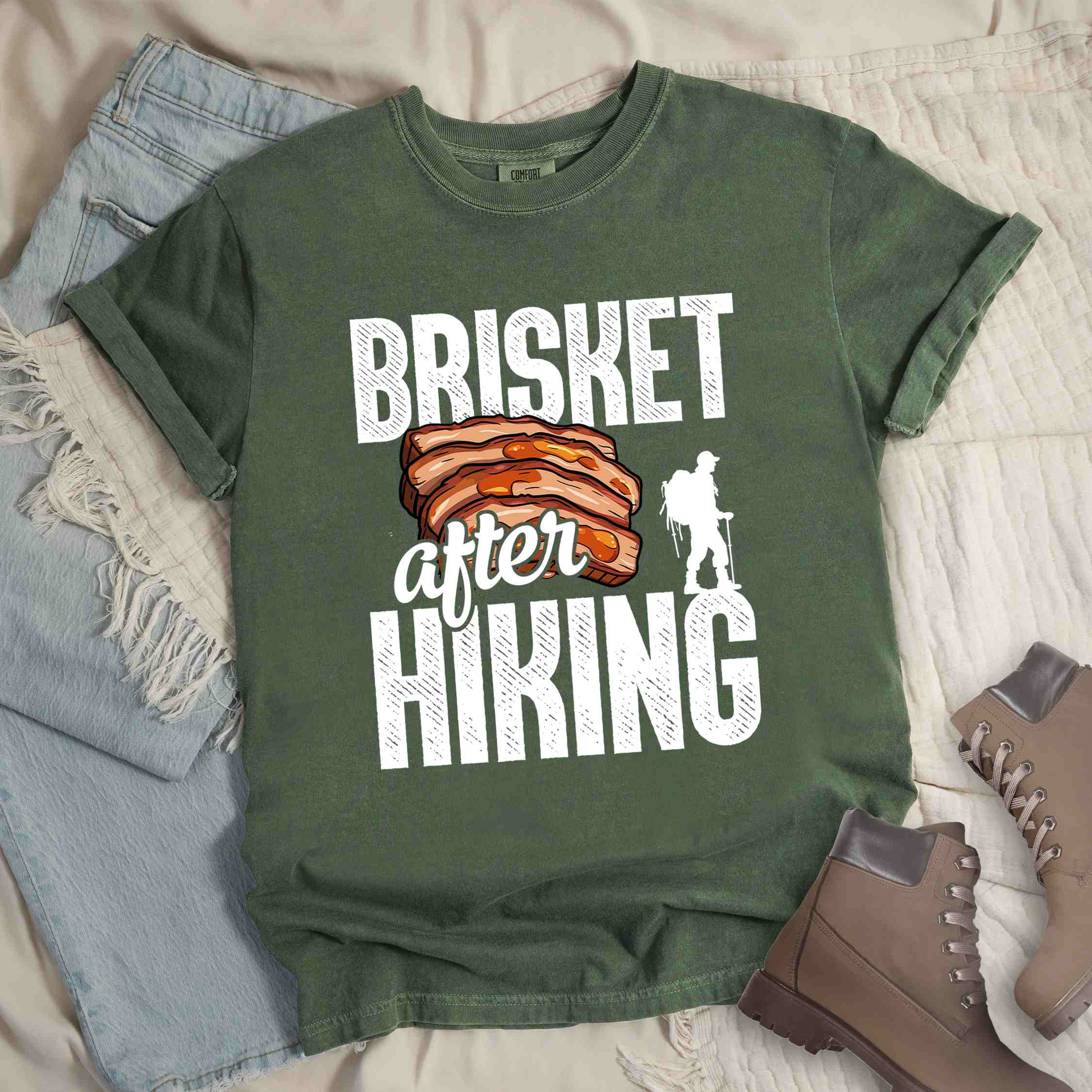 Moss "Brisket after hiking" colored vintage tee with bold typography, birds, mountains, illustrated bbq beef brisket, and backpacker for bbq lovers.