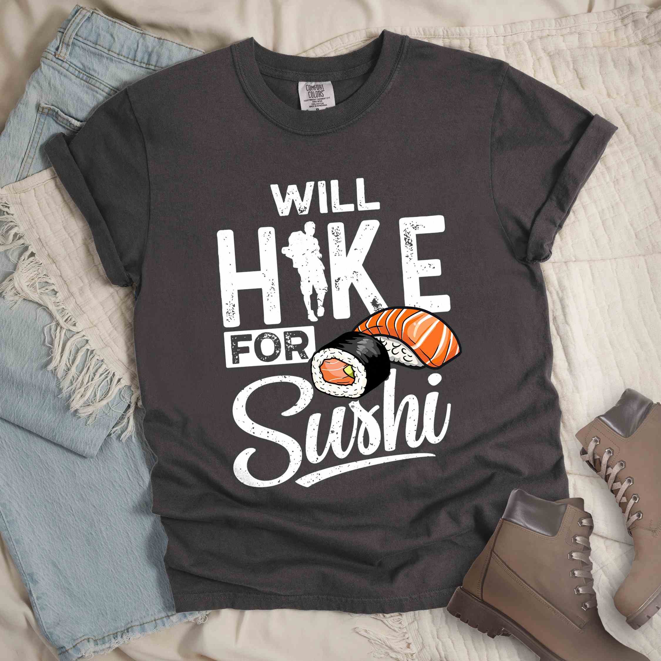 Pepper "Will hike for sushi" colored vintage tee with bold typography, birds, mountains, illustrated sushi platter, and backpacker for sushi lovers.