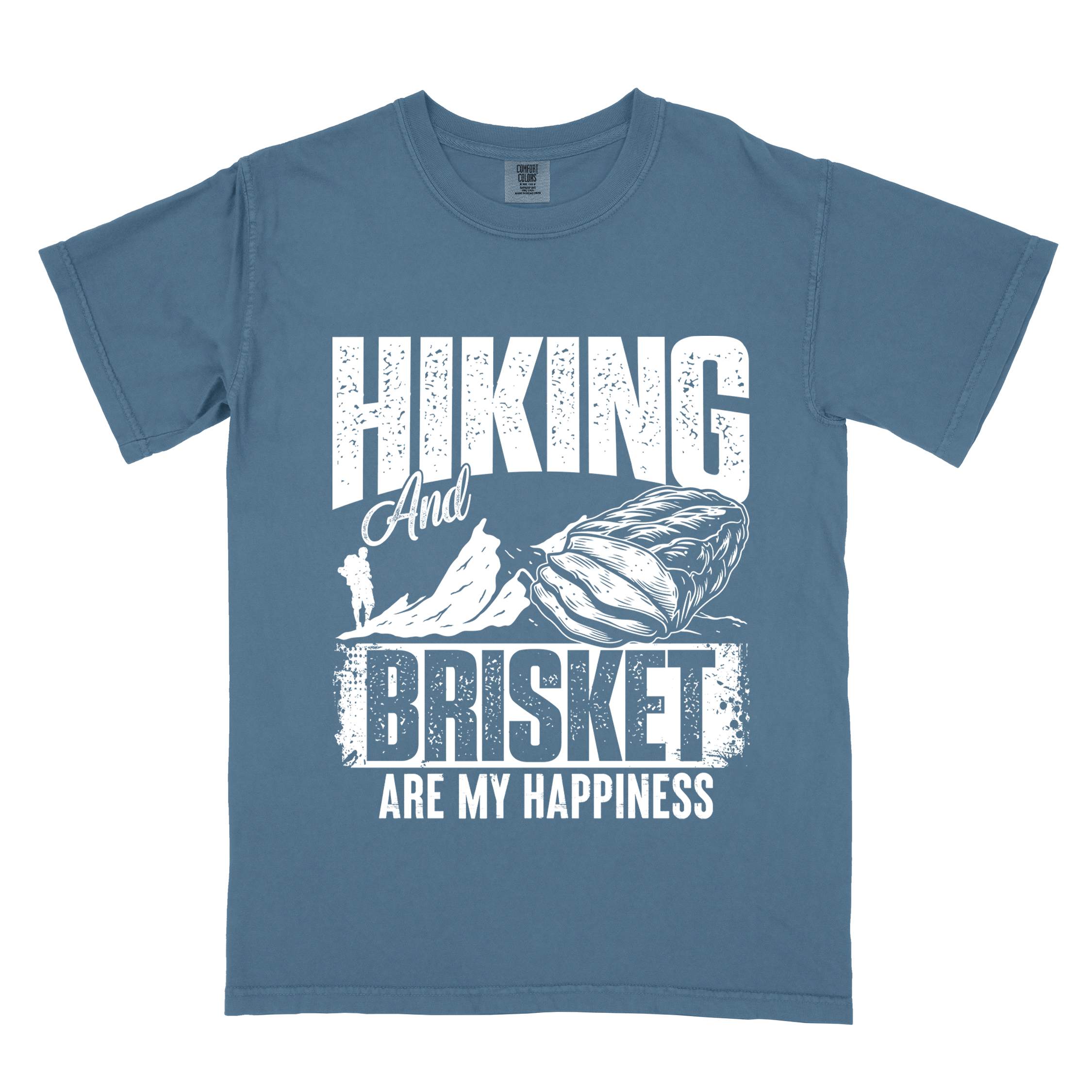 Blue jean "hiking and brisket are my happiness" colored vintage tee with bold typography, birds, mountains, illustrated bbq beef brisket, and backpacker for bbq lovers.