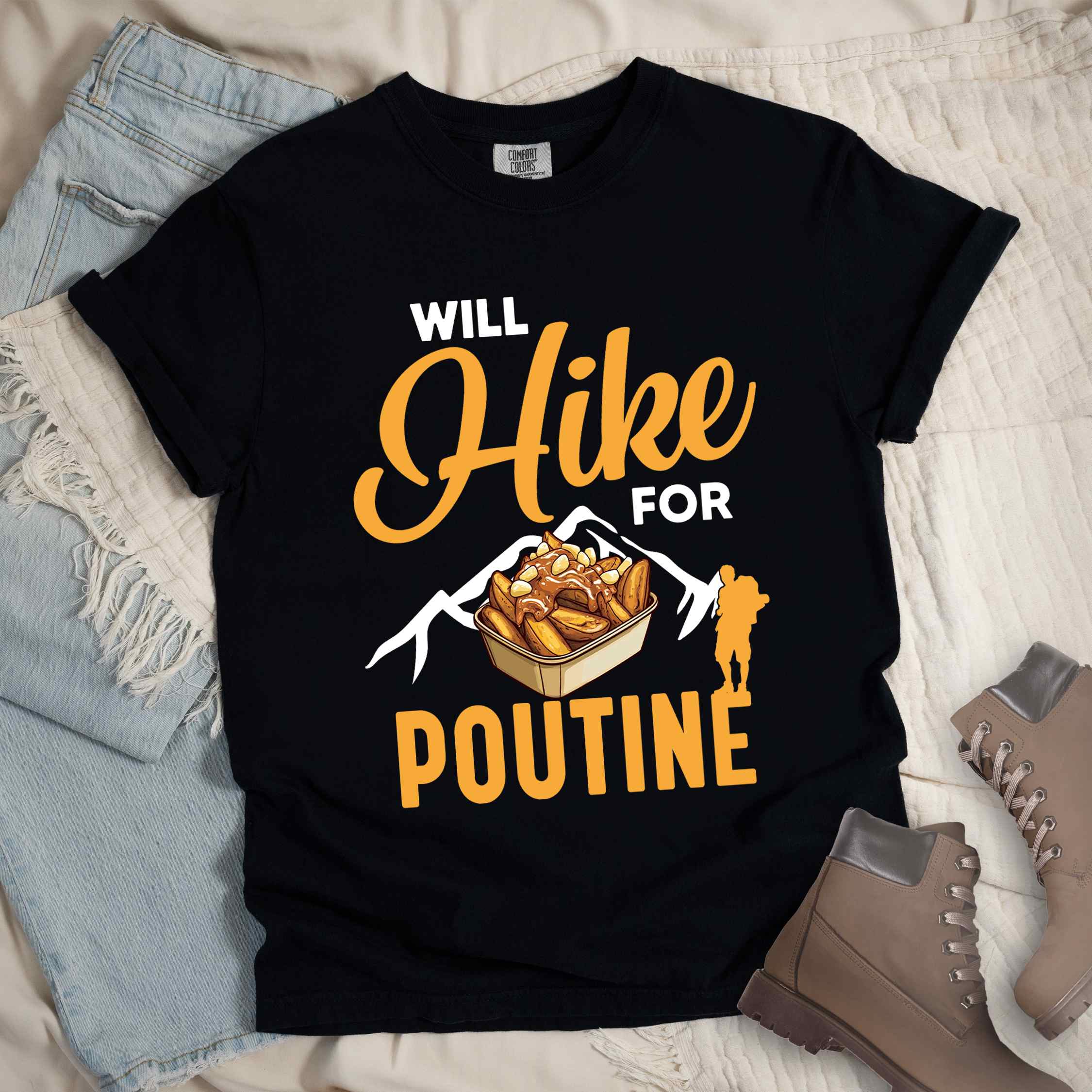 Black "Will hike for poutine" colored vintage tee with bold typography, mountains, illustrated a serving of poutine and backpackers looking for comfort food.