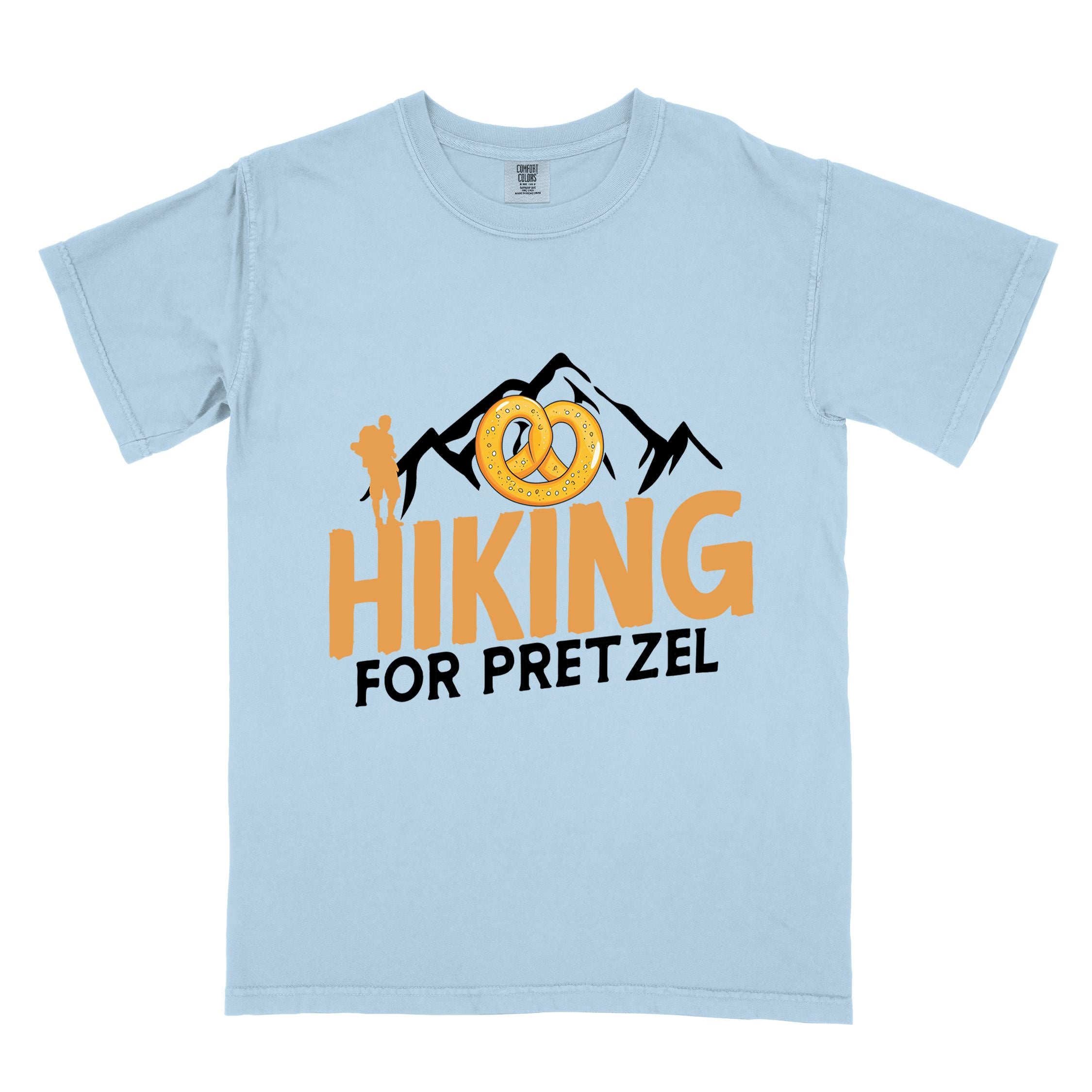 Chambray "Hiking for pretzel" colored vintage tee with bold typography, mountains, birds, and illustrated pretzel for baked pretzel lovers