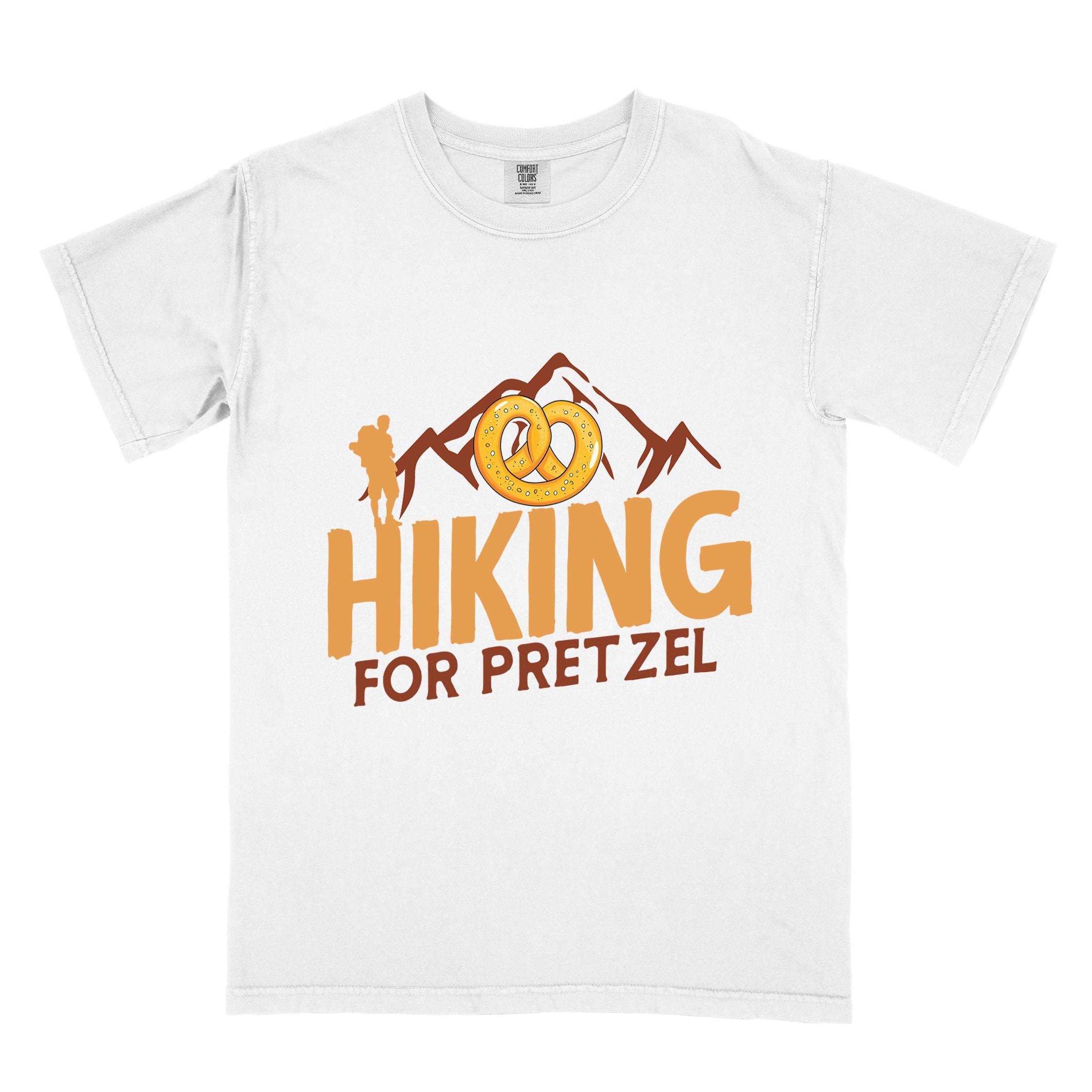 White "Hiking for pretzel" colored vintage tee with bold typography, mountains, birds, and illustrated pretzel for baked pretzel lovers