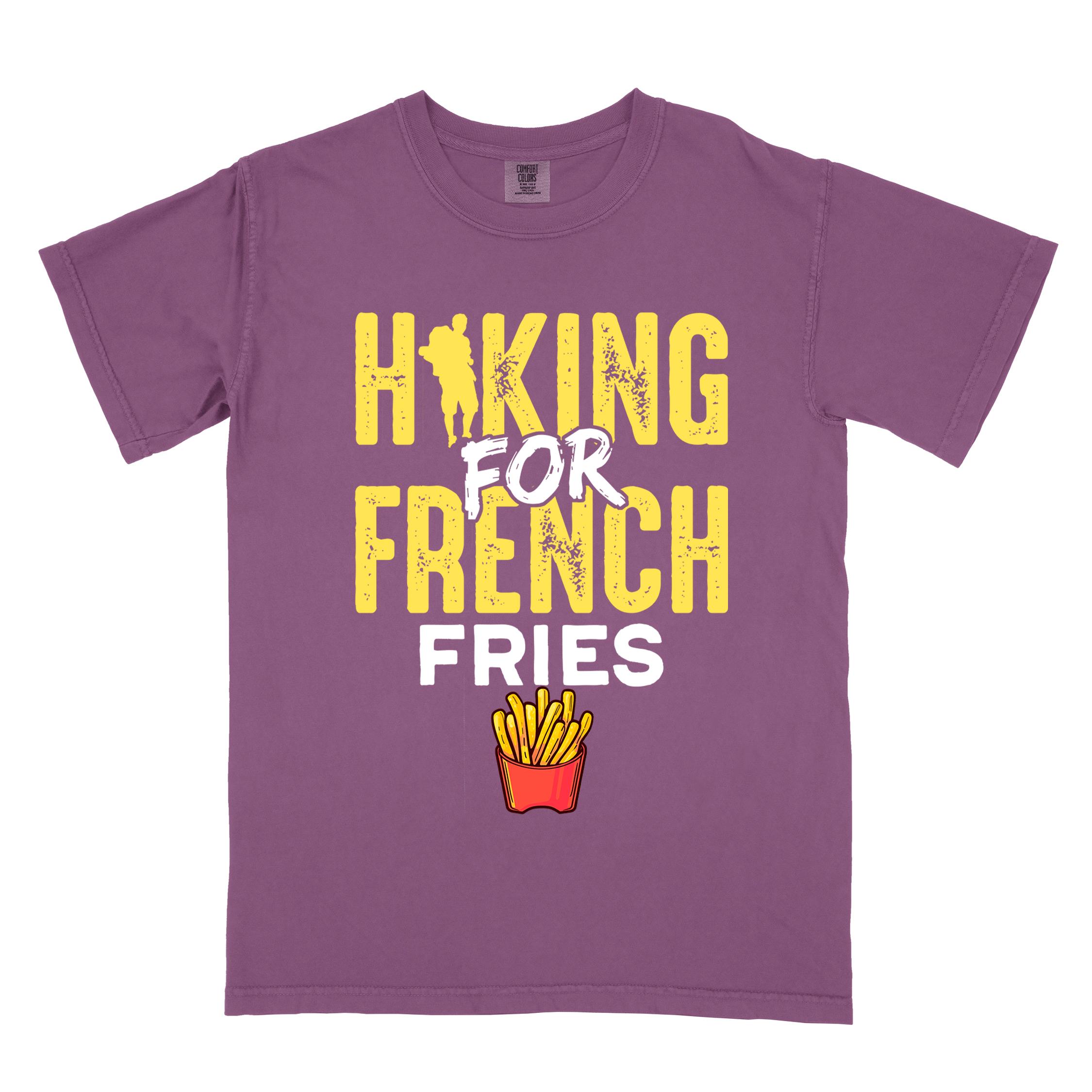 Berry "Hiking for french fries" colored vintage tee with bold typography, mountains, illustrated fries, and backpacker for comfort food enthusiasts.