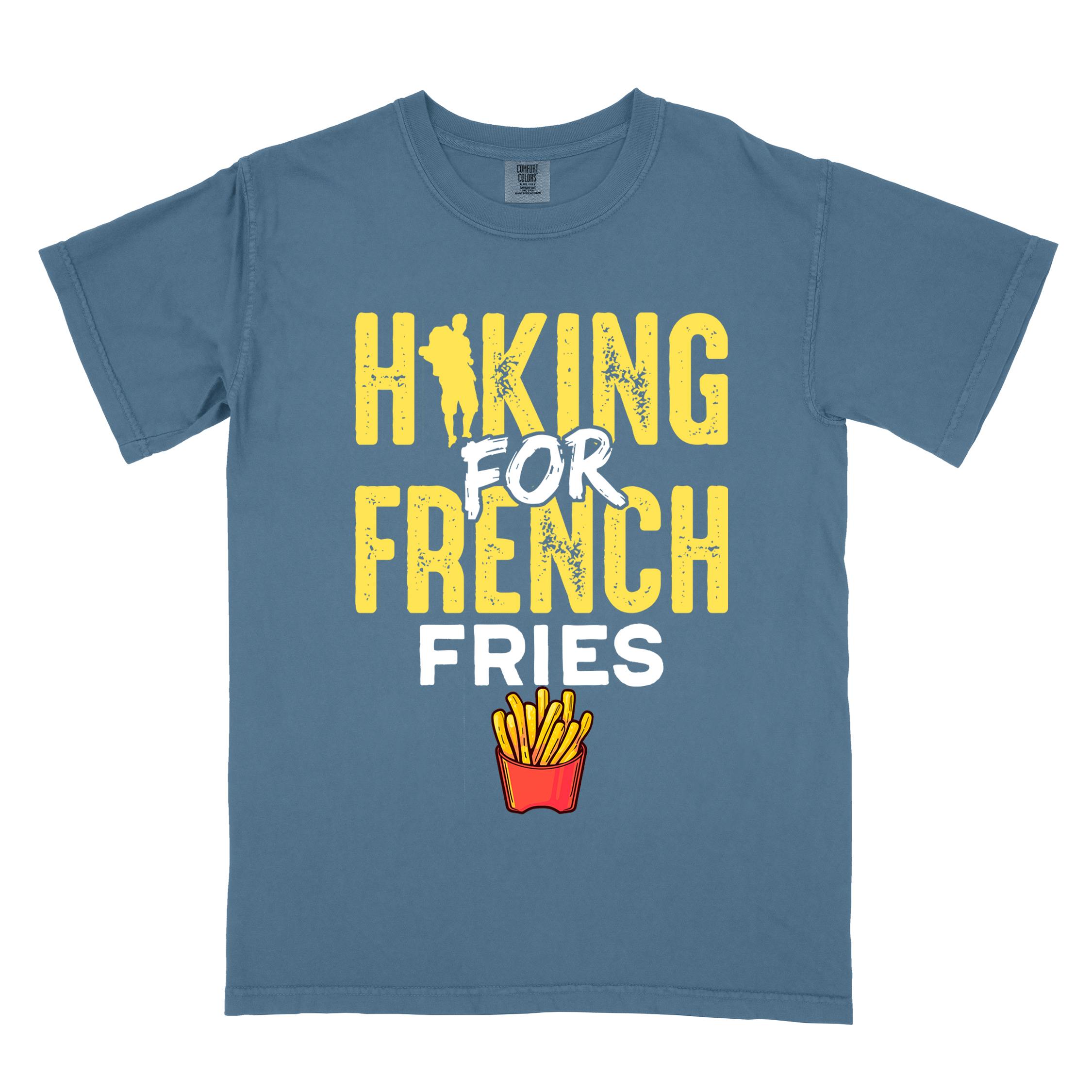 blue jean "Hiking for french fries" colored vintage tee with bold typography, mountains, illustrated fries, and backpacker for comfort food enthusiasts.