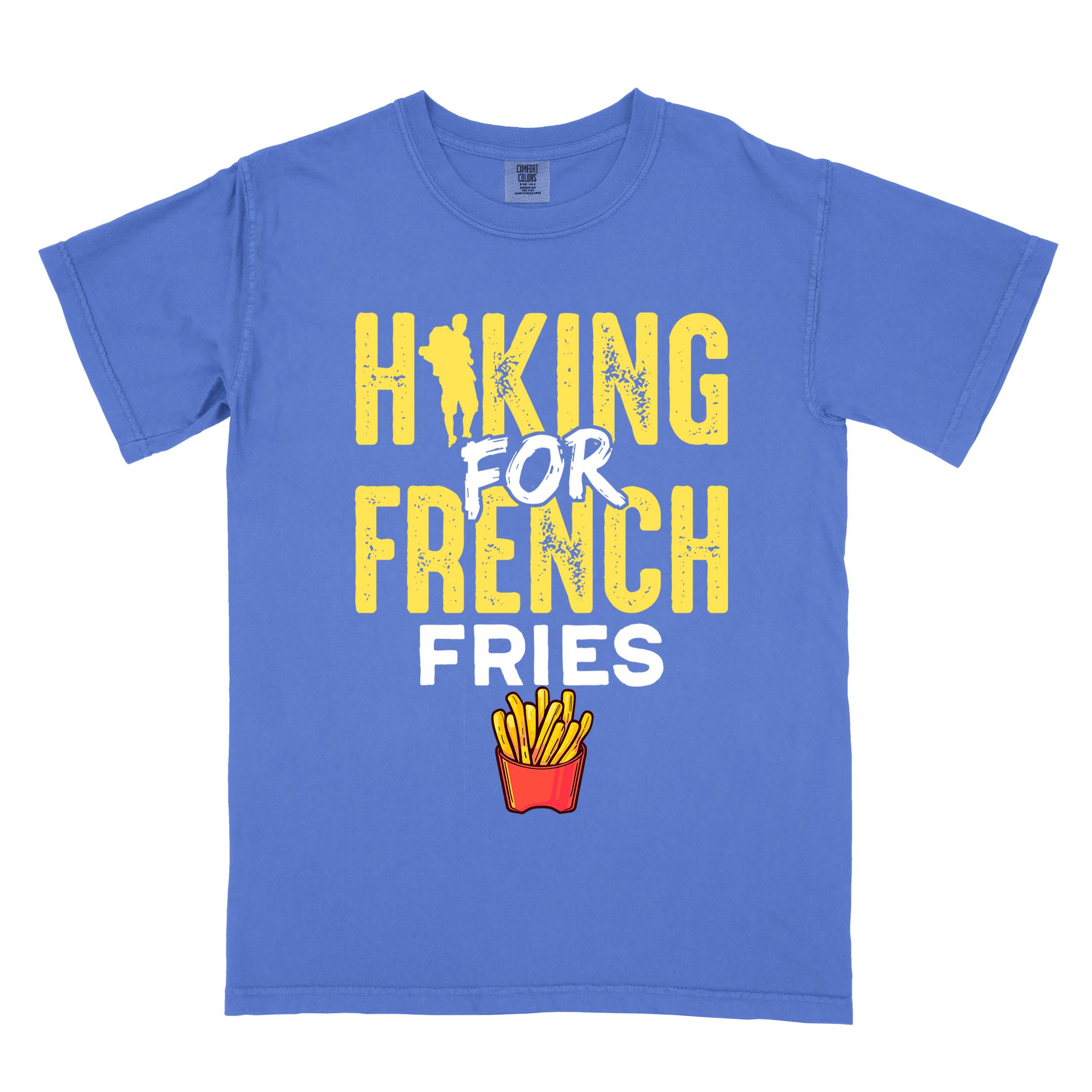 Flo blue "Hiking for french fries" colored vintage tee with bold typography, mountains, illustrated fries, and backpacker for comfort food enthusiasts.
