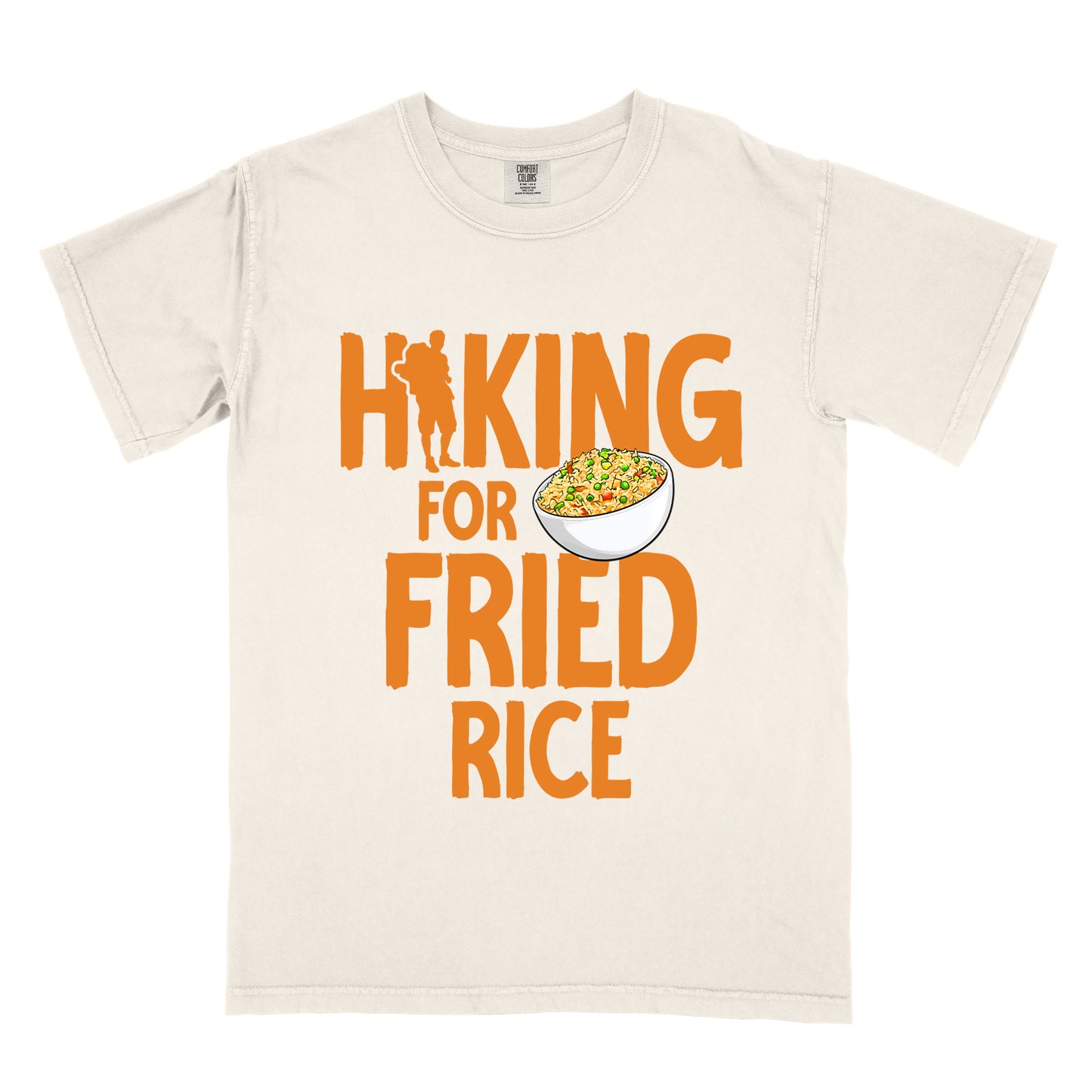 Ivory (Cream White) t-shirt with orange text reading "HIKING FOR FRIED RICE". "HIKING" appears at the top with a hiker silhouette integrated into the letter "I", "FOR" in smaller text in the middle, and "FRIED RICE" in large letters at the bottom. Features an illustration of a white bowl filled with colorful fried rice with vegetables next to "FOR" and above "FRIED".