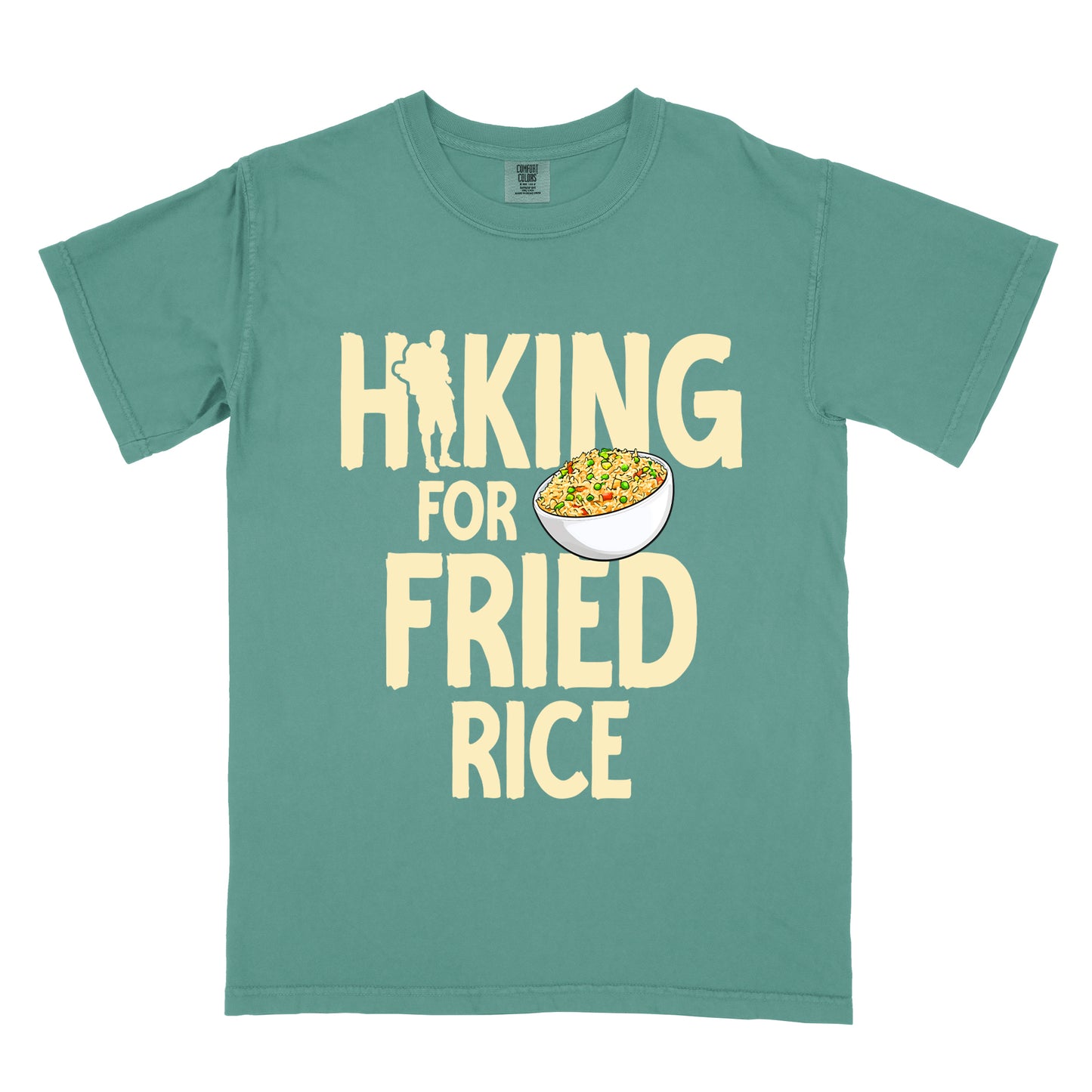 Light Green t-shirt with pale yellow text reading "HIKING FOR FRIED RICE". "HIKING" appears at the top with a hiker silhouette integrated into the letter "I", "FOR" in smaller text in the middle, and "FRIED RICE" in large letters at the bottom. Features an illustration of a white bowl filled with colorful fried rice with vegetables next to "FOR" and above "FRIED".