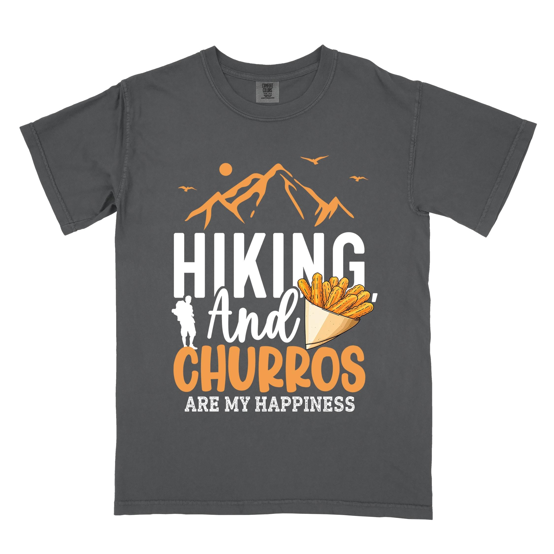 Graphite "hiking and churros are my happiness " colored vintage tee with bold typography, mountains, birds, illustrated a serving of Churros, and backpackers with a sweet tooth.