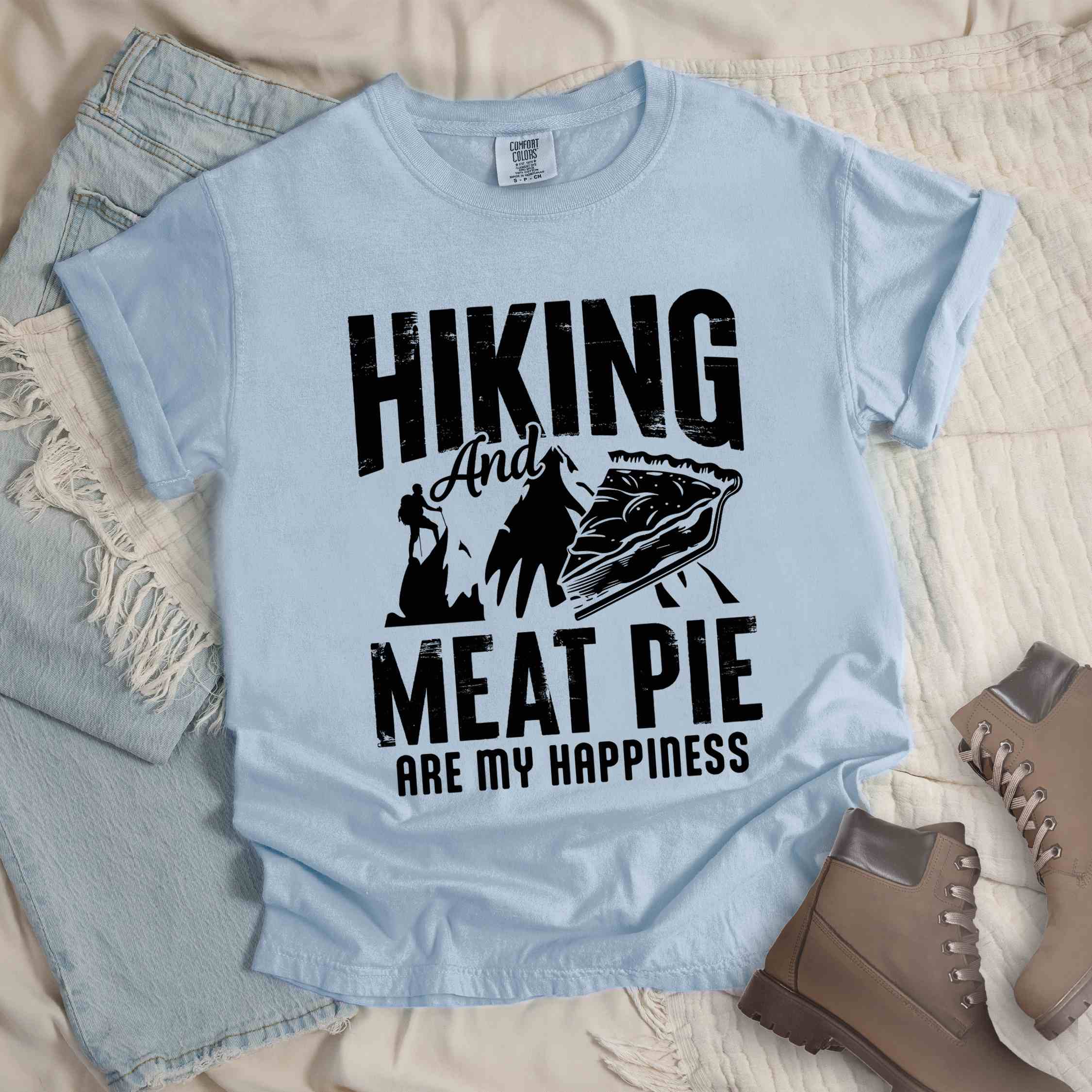 Chambray "Hiking and Meat Pie are my Happiness" colored vintage tee with bold typography, mountains, and illustrated slice of pie for pie lovers