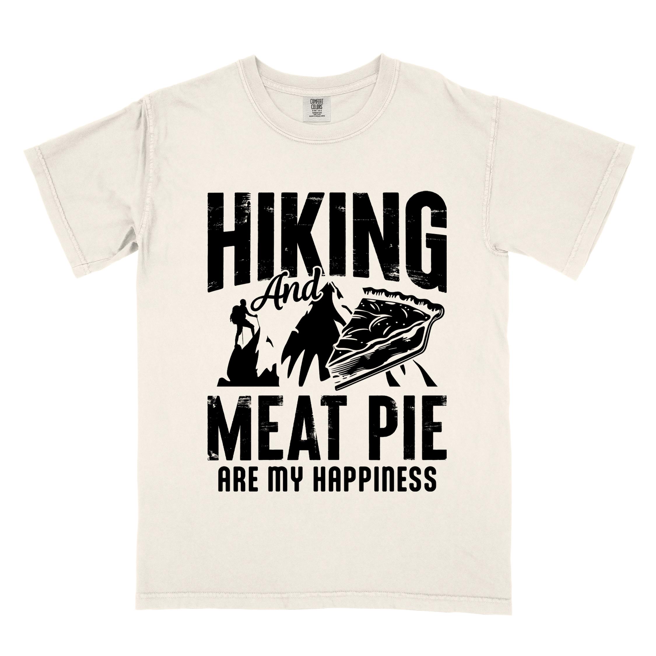 Ivory "Hiking and Meat Pie are my Happiness" colored vintage tee with bold typography, mountains, and illustrated slice of pie for pie lovers