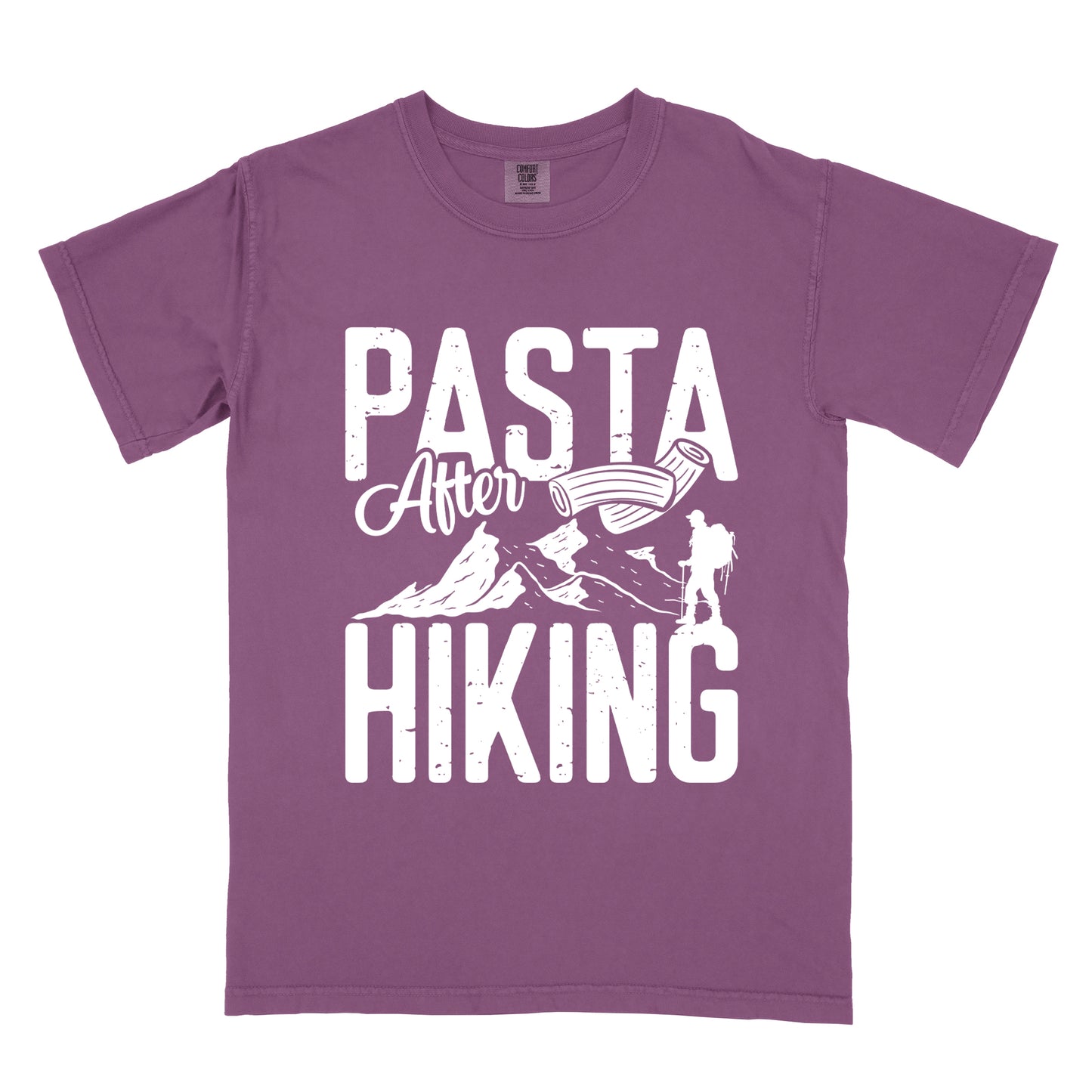 Berry (Dark Violet) t-shirt with white distressed text reading "PASTA After HIKING". "PASTA" appears in large block letters at the top, "After" in script in the middle, and "HIKING" in large block letters at the bottom. Features white mountain silhouettes in the center, a white hiker silhouette on the right side, and an illustration of penne pasta above the mountains.