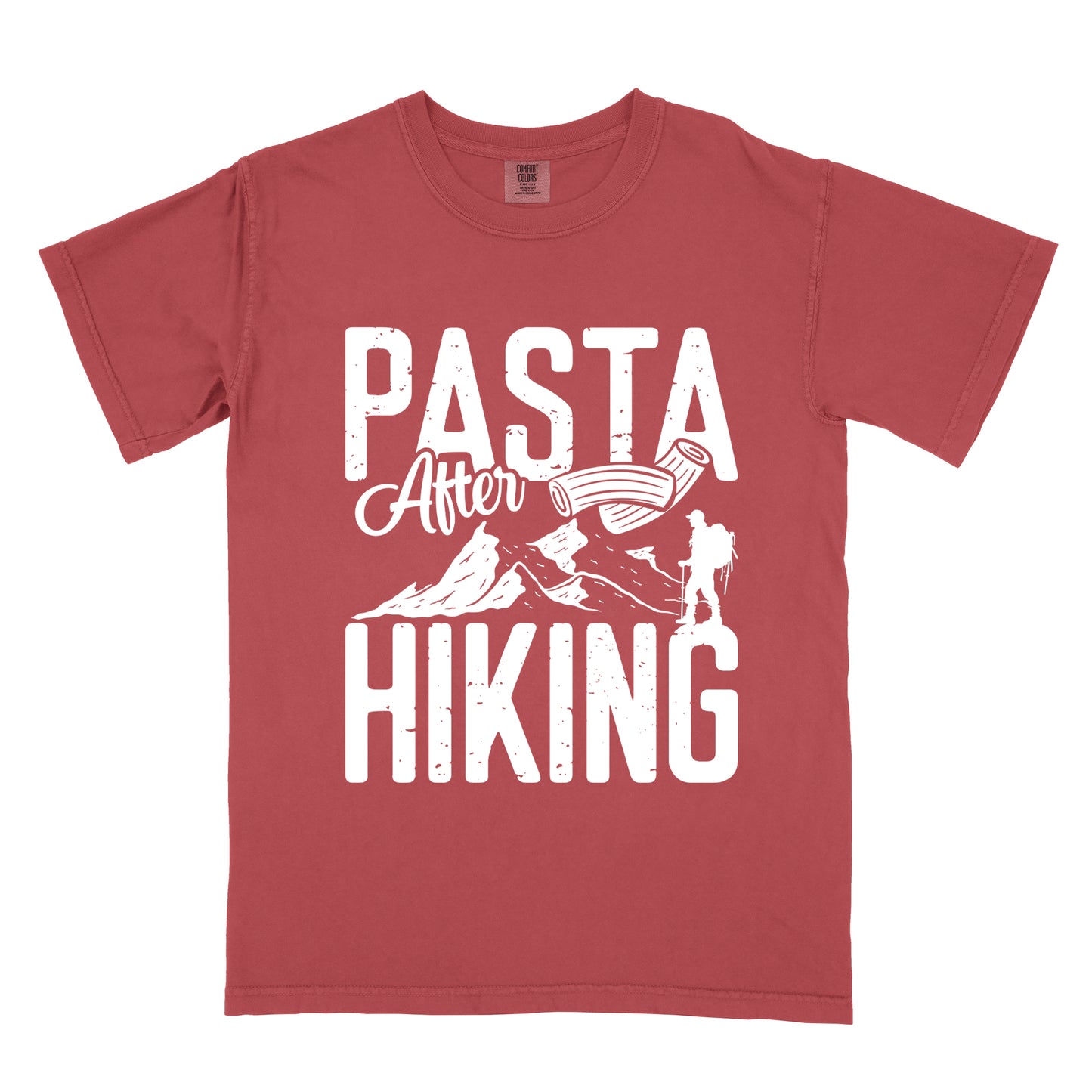 Crimson (Dark Pink) t-shirt with white distressed text reading "PASTA After HIKING". "PASTA" appears in large block letters at the top, "After" in script in the middle, and "HIKING" in large block letters at the bottom. Features white mountain silhouettes in the center, a white hiker silhouette on the right side, and an illustration of penne pasta above the mountains.