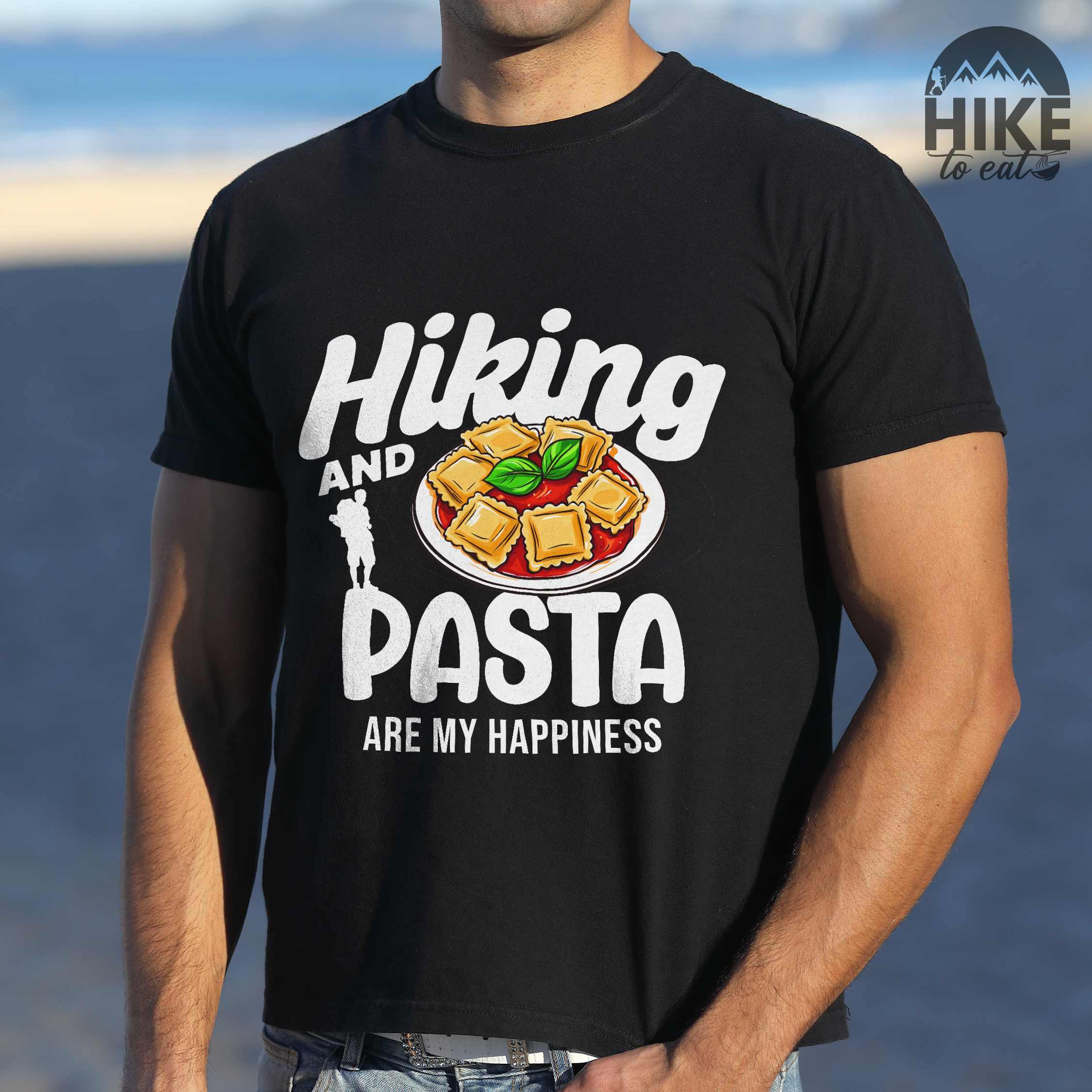Man wearing black "Hiking and pasta are my happiness" colored vintage tee with bold typography, illustrated plate of pasta, and backpackers for pasta lovers.