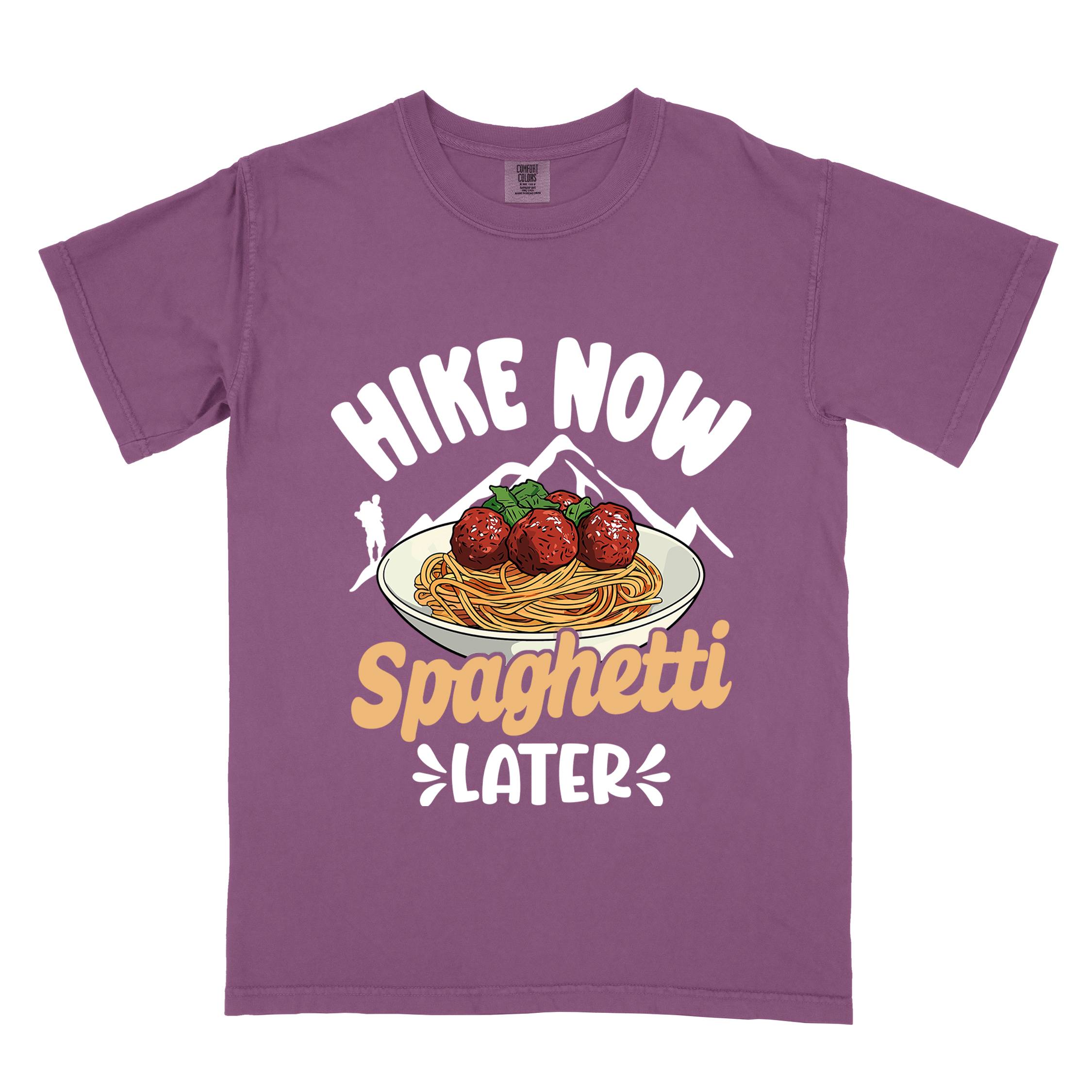 Berry "Hike now spaghetti later" colored vintage tee with bold typography, mountains, birds, illustrated plate of spaghetti meatballs, and backpackers for pasta lovers.