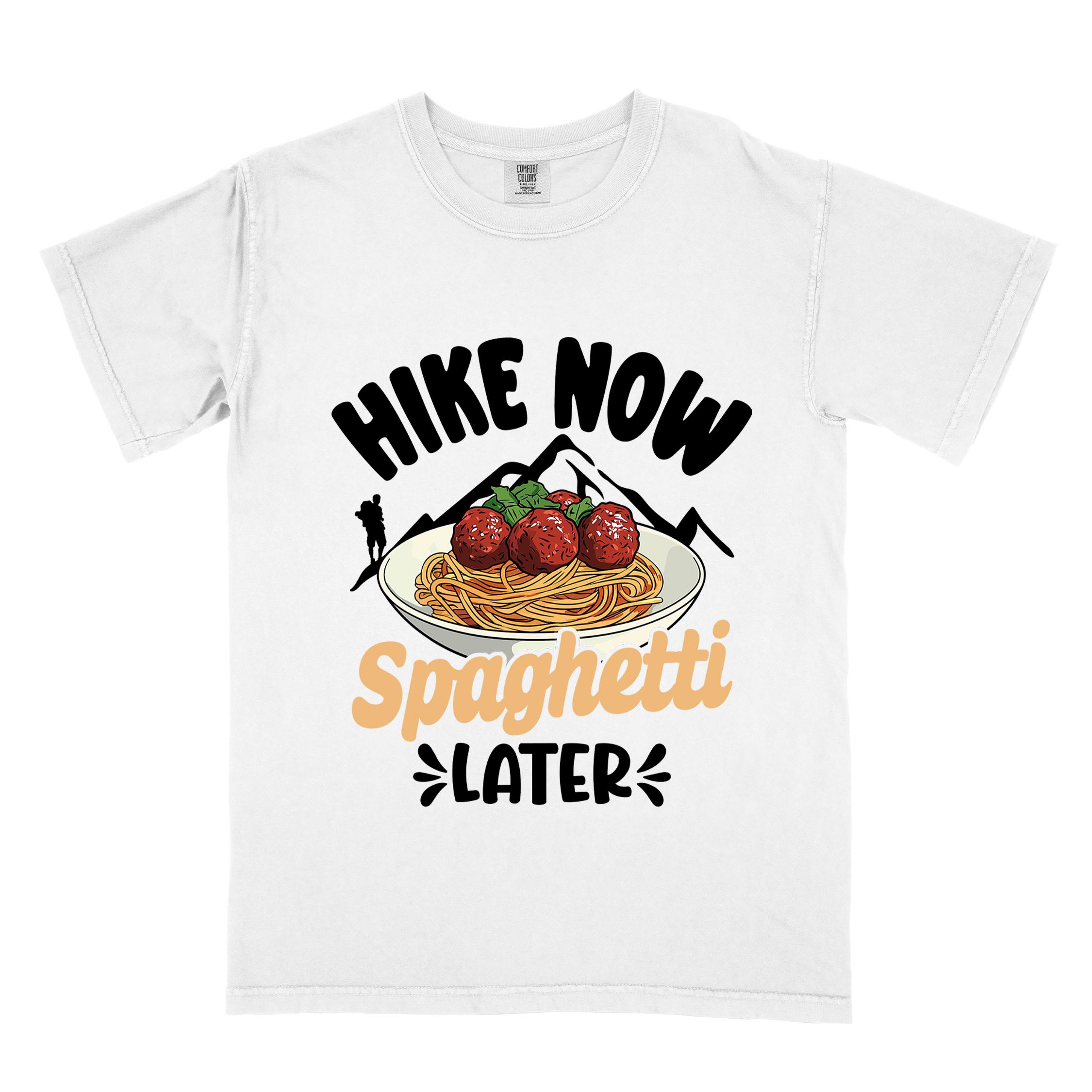 White "Hike now spaghetti later" colored vintage tee with bold typography, mountains, birds, illustrated plate of spaghetti meatballs, and backpackers for pasta lovers.