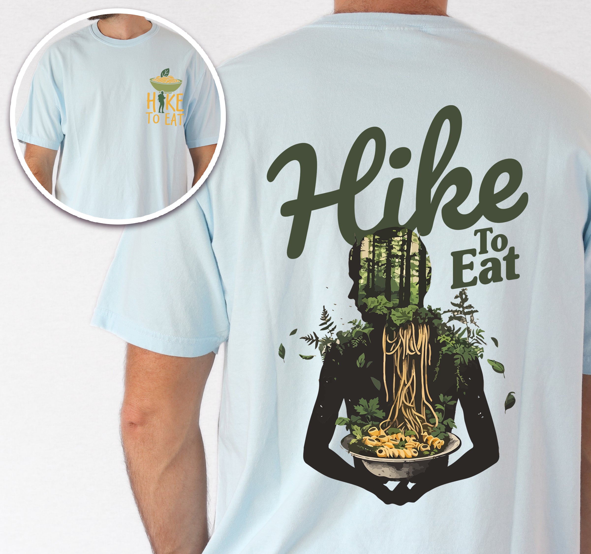 Chambray (Light Blue) colored Hike to Eat t-shirt front and back view showing small colorful chest detail and large back design featuring 'Nature's Bowl' with person silhouette filled with forest trees holding bowl of pasta, surrounded by floating leaves.