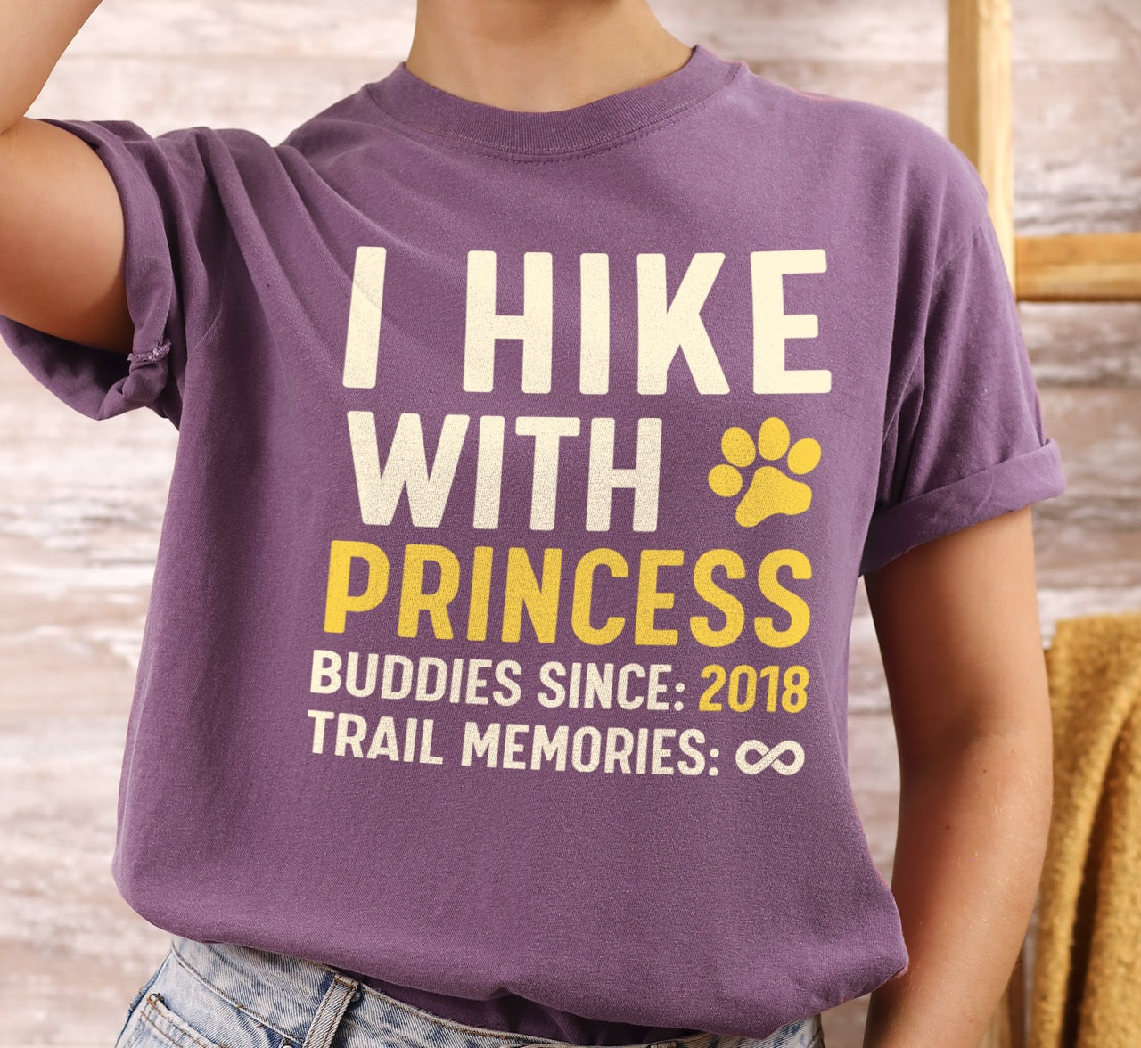 Woman wearing purple Personalized trail buddies shirt for dog hikers with custom pet name  of Princess paw print and buddies since year of 2018 featuring infinite memories design perfect gift for outdoor enthusiasts and their canine hiking partner