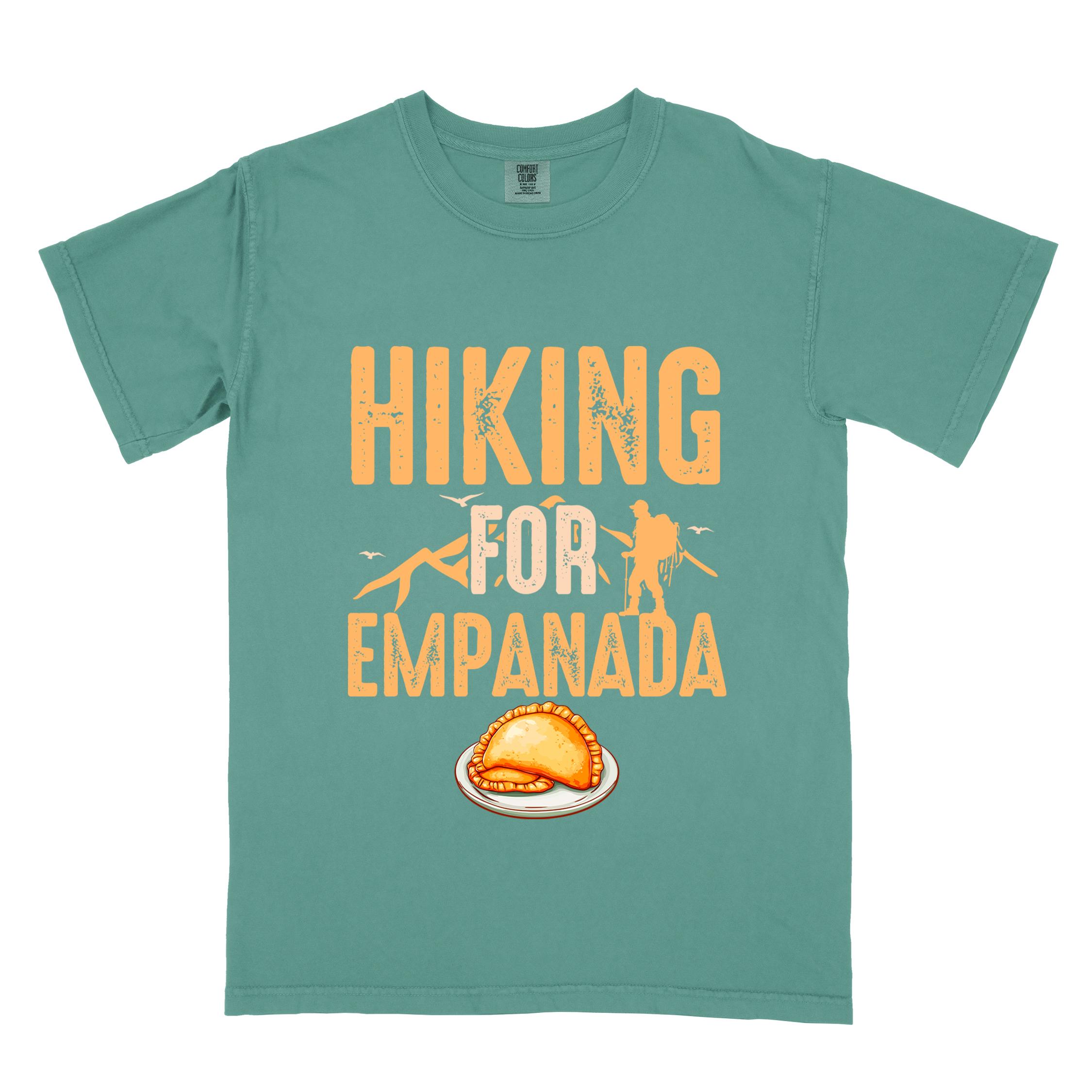 Light green "Hiking for empanada" colored vintage tee with bold typography, illustrated freshly baked empanada, mountains, birds, and backpackers for asian cuisine enthusiasts.