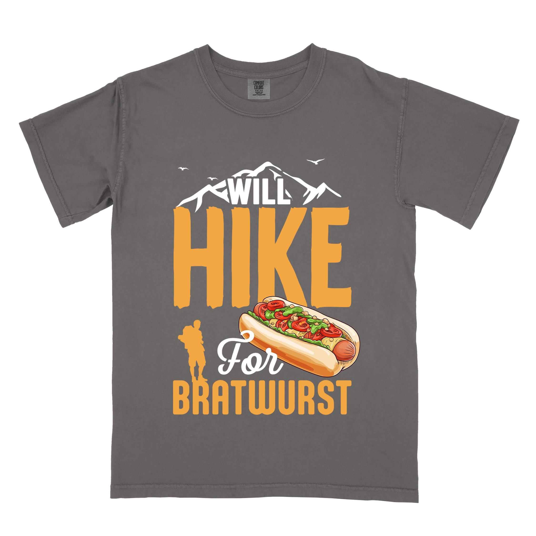 Pepper "Will hike for bratwurst" colored vintage tee with bold typography, illustrated bratwurst in a bun, mountains, birds, and backpackers for street food enthusiasts.