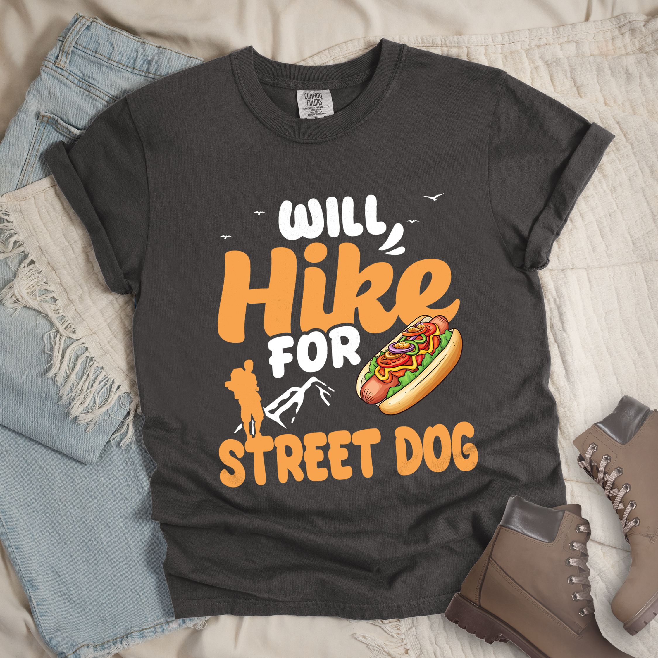 Dark grey shirt with Hiking Design featuring the phrase “Will Hike for Street Dog” and an illustration of a hot dog with toppings.