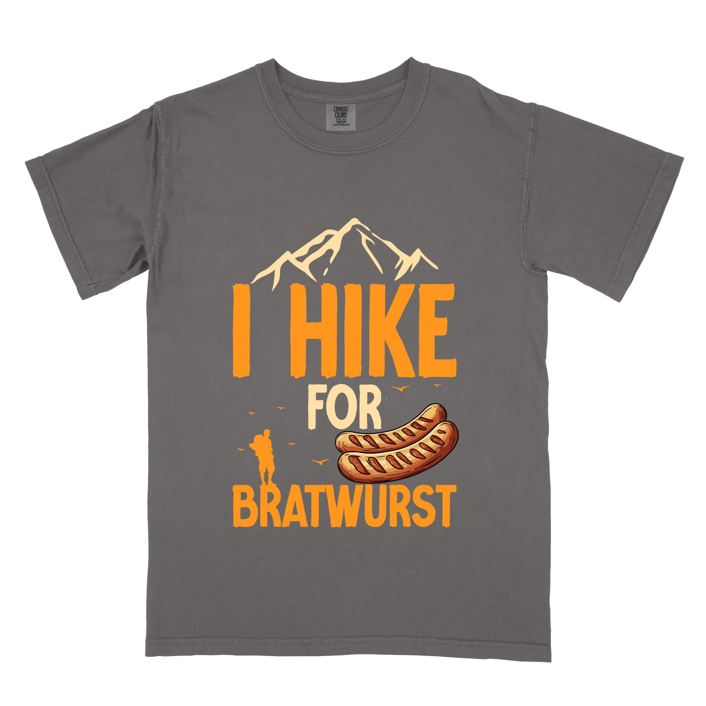 Pepper "I hike for bratwurst" colored vintage tee with bold typography, illustrated bratwurst, mountains, birds, and backpackers for street dog lovers.