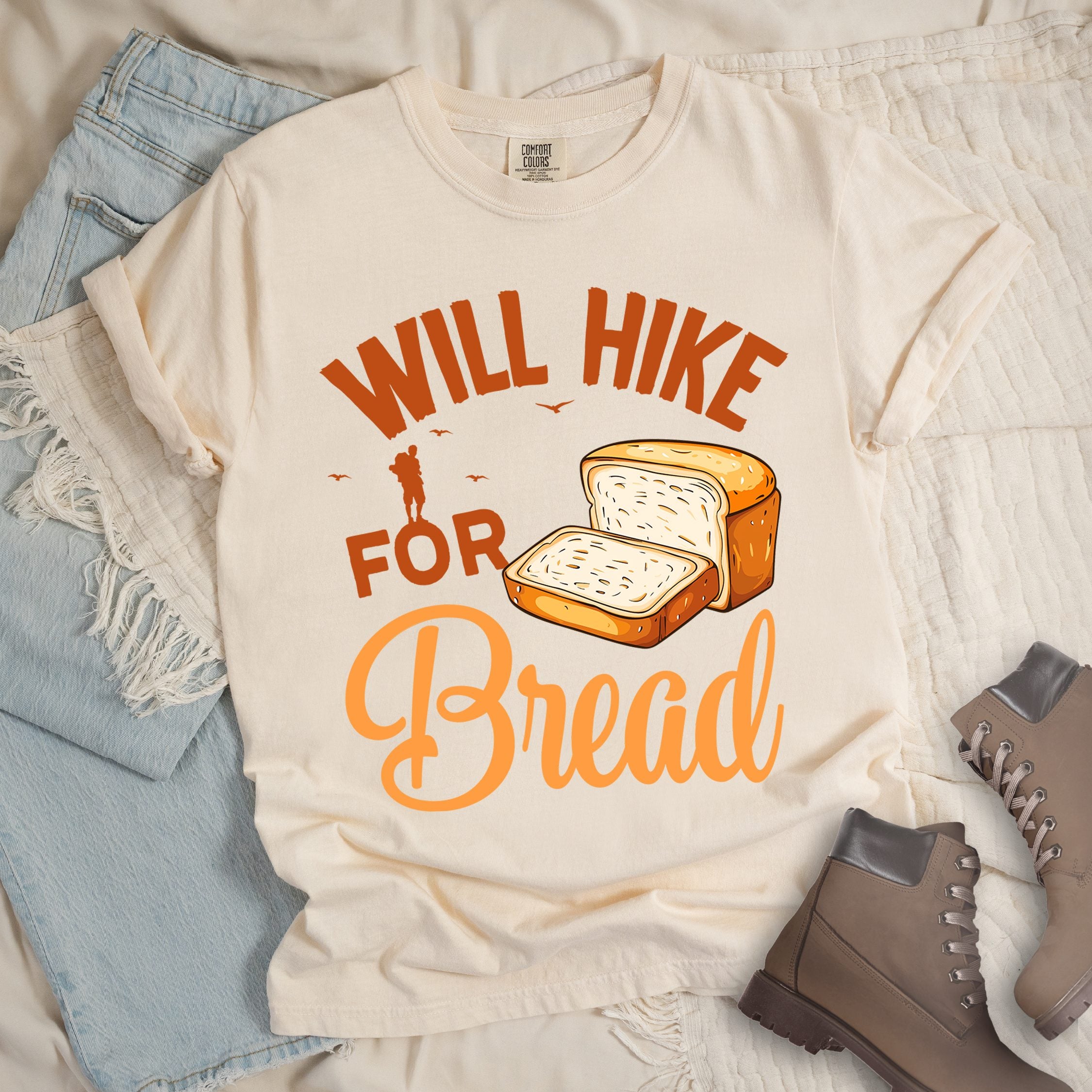 Ivory shirt with Hiking Design featuring the phrase “Will Hike for Bread” and an illustration of sliced bread loaves.