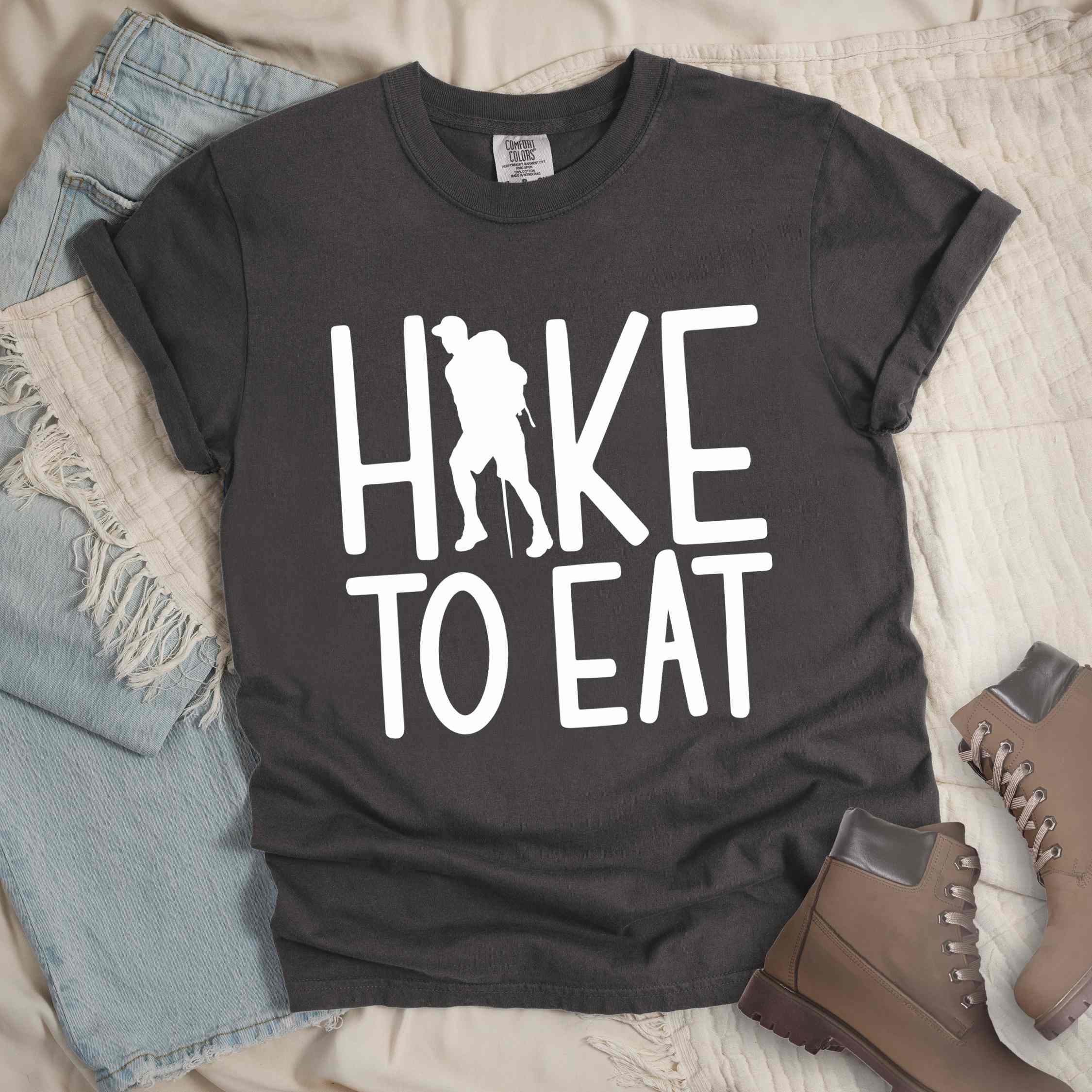 Pepper "Hike to Eat" colored statement tee with bold typography, perfect for food motivated individuals.