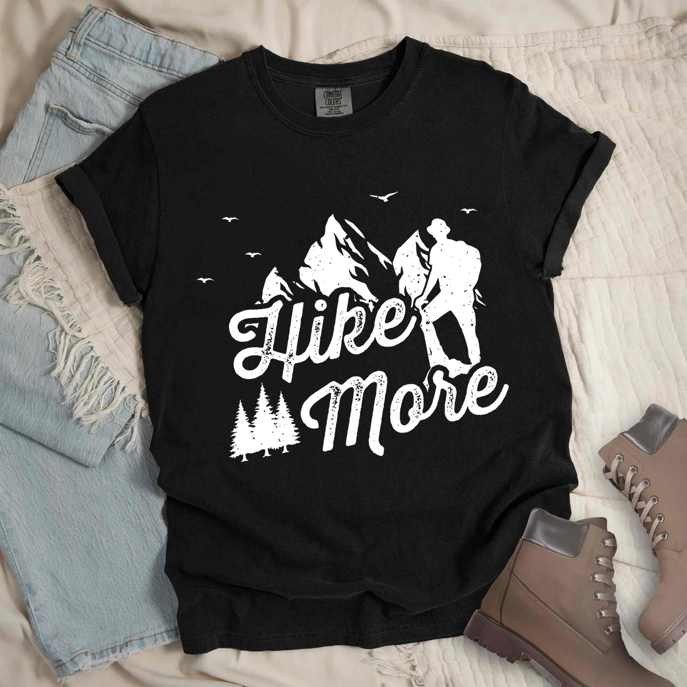 Black "Hike More" colored statement tee with bold typography, mountains, birds, perfect for food motivated individuals.