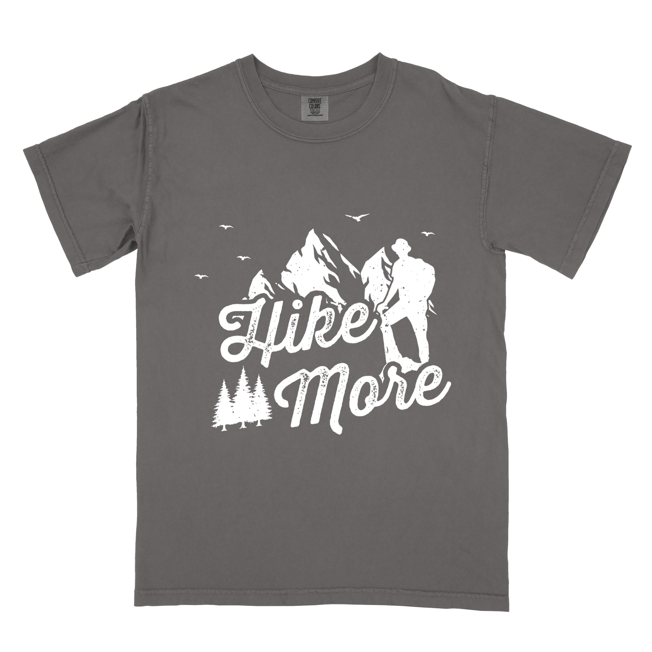Pepper "Hike More" colored statement tee with bold typography, mountains, birds, perfect for food motivated individuals.