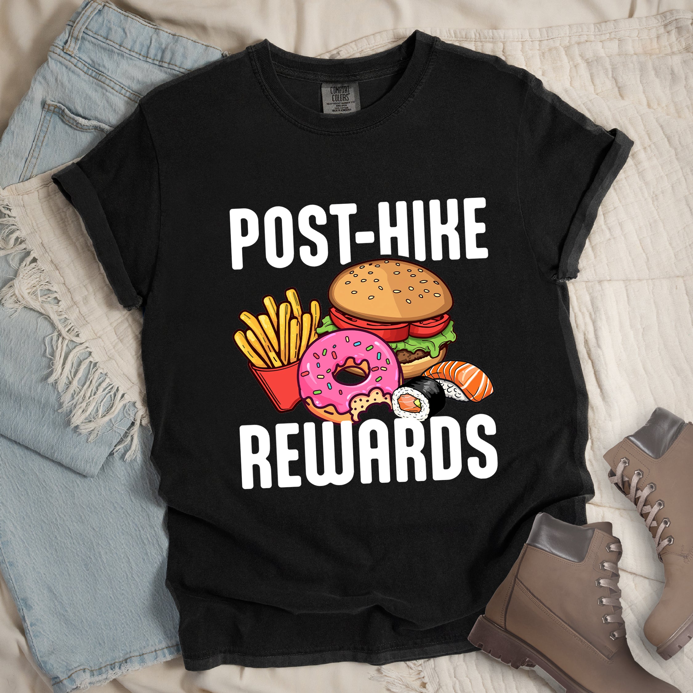 Black colored hiking shirt displaying white POST-HIKE REWARDS text with colorful burger, french fries, donut, and sushi illustrations