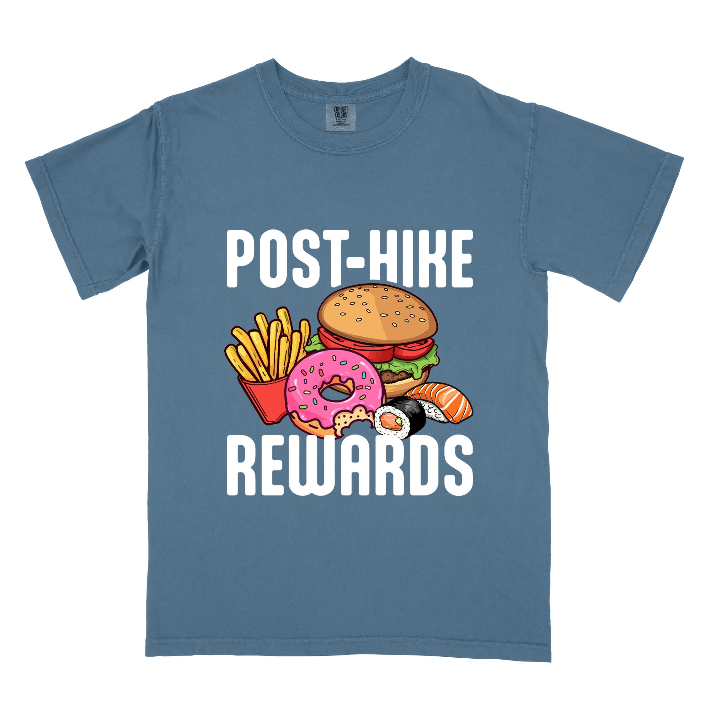 Blue jean "Post-hike rewards" colored statement tee with bold typography, mountains, birds, illustrated fast food meal, perfect for adventure motivated individuals and looking for post-hike meal.