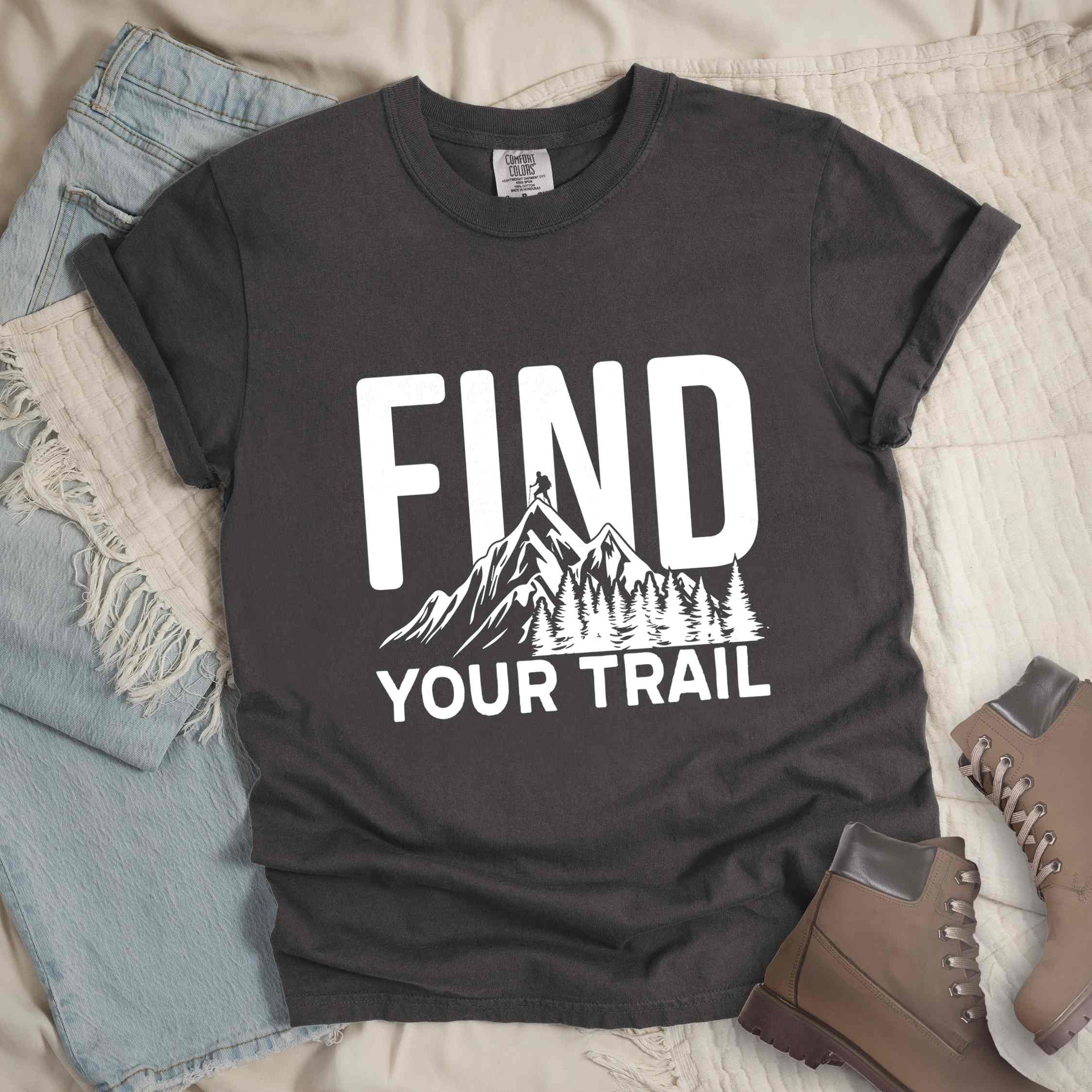 Pepper "Find your trail" colored statement tee with bold typography, mountains, birds, perfect for adventure motivated individuals.