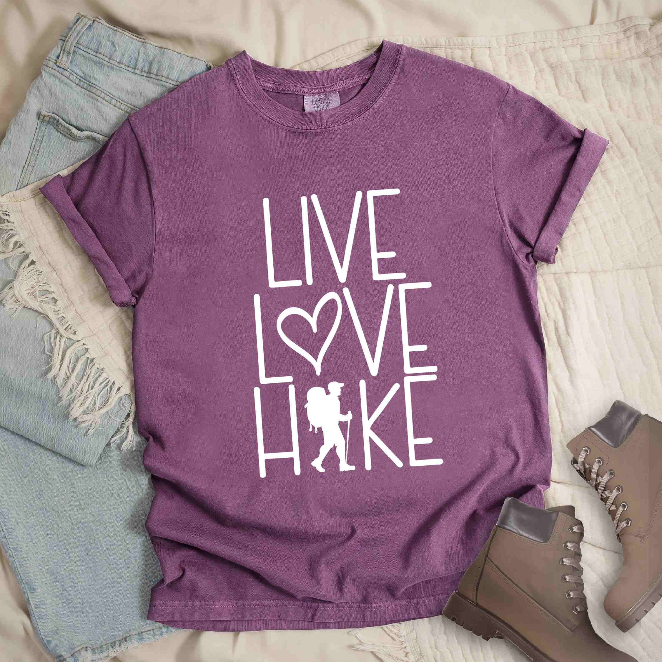 Berry "Live Love hike" colored statement tee with bold typography, perfect for adventure motivated individuals.