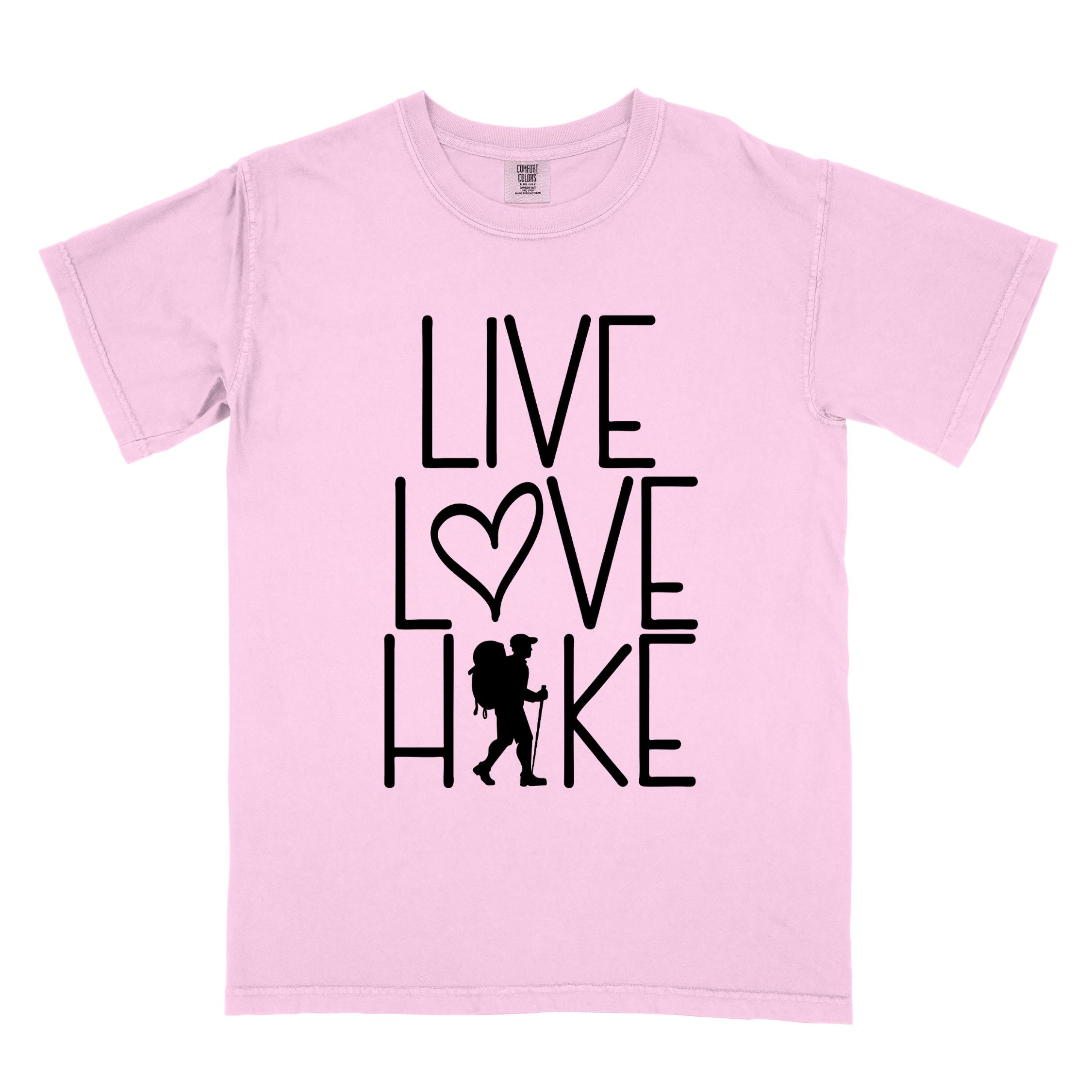 blossom "Live Love hike" colored statement tee with bold typography, perfect for adventure motivated individuals.