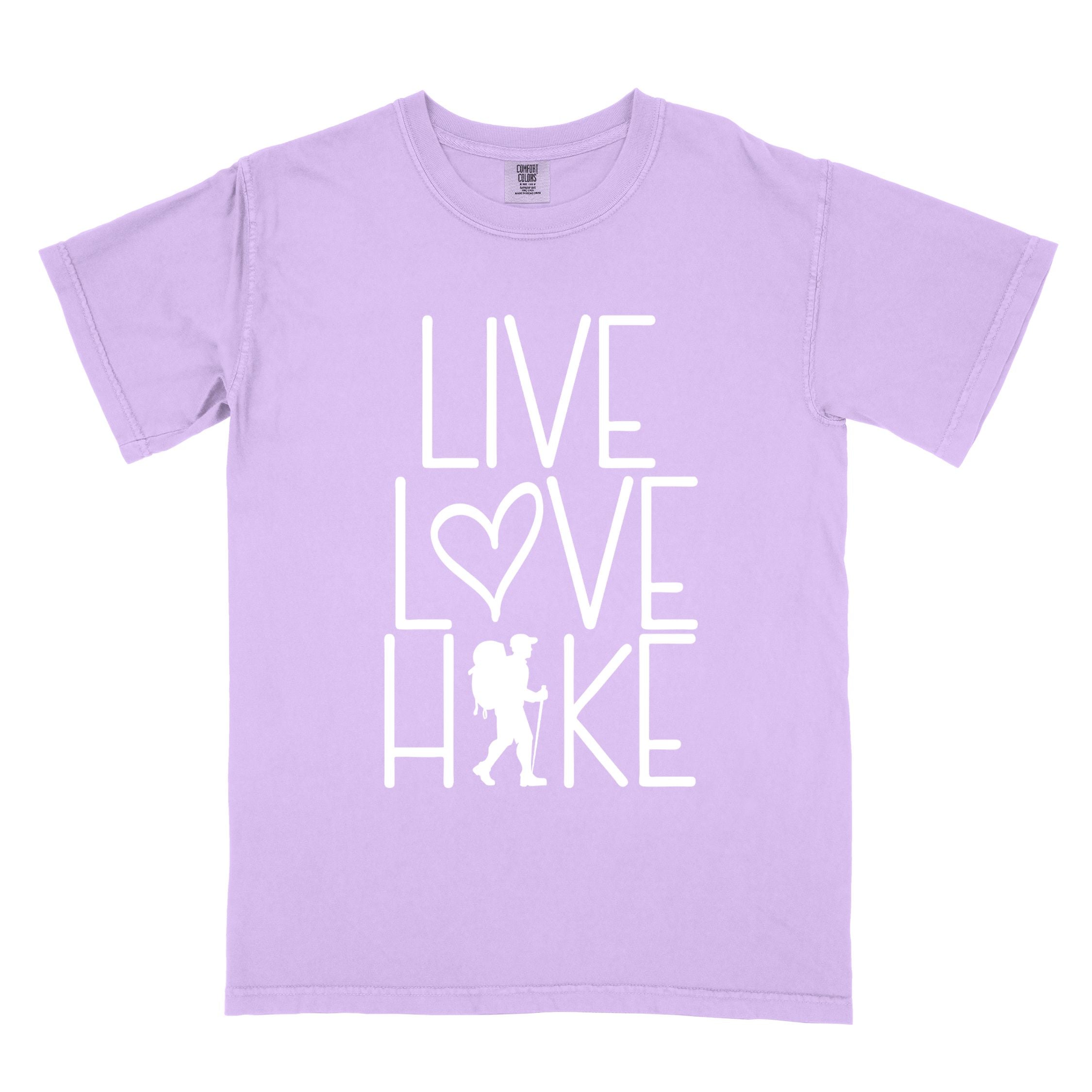 Orchid "Live Love hike" colored statement tee with bold typography, perfect for adventure motivated individuals.
