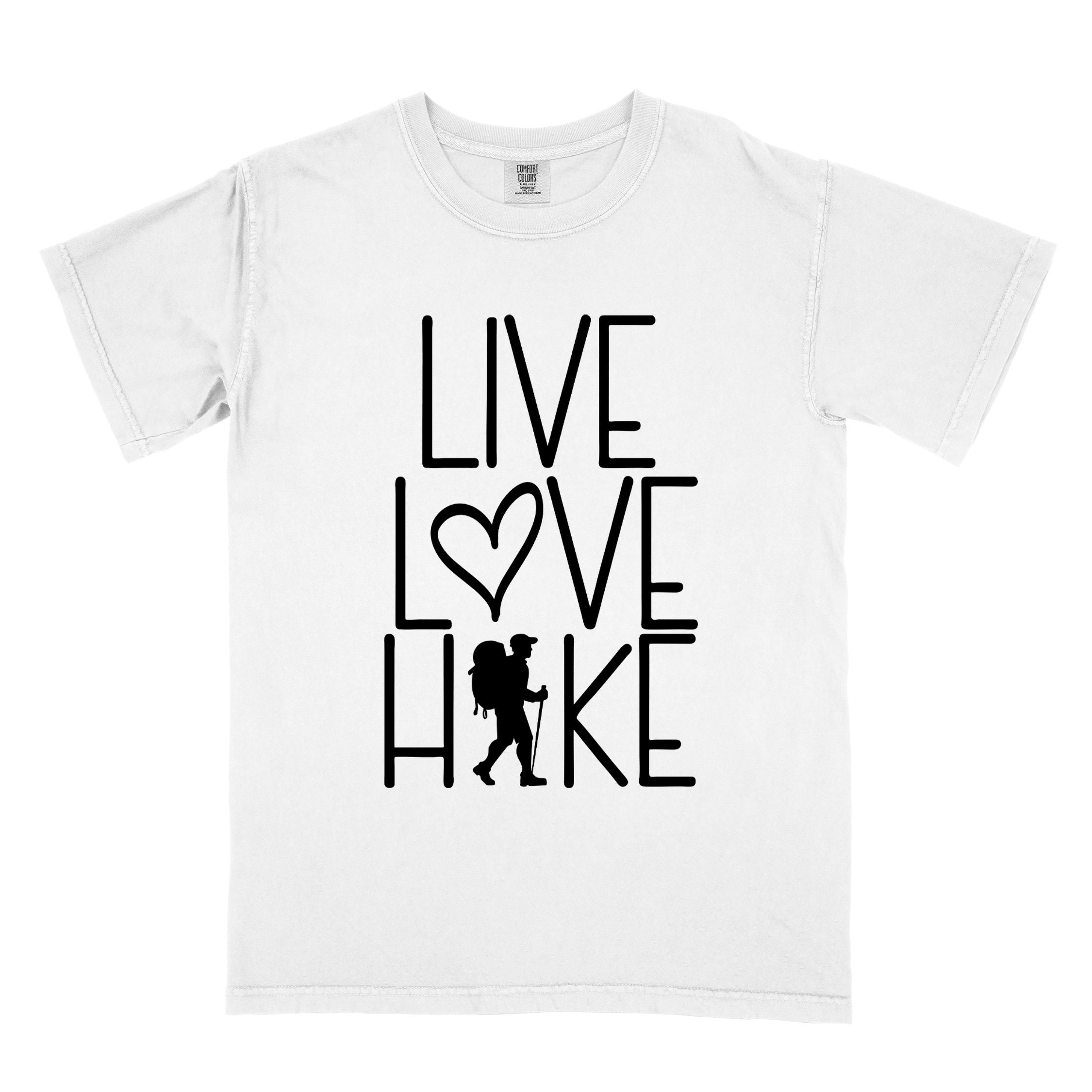 White "Live Love hike" colored statement tee with bold typography, perfect for adventure motivated individuals.